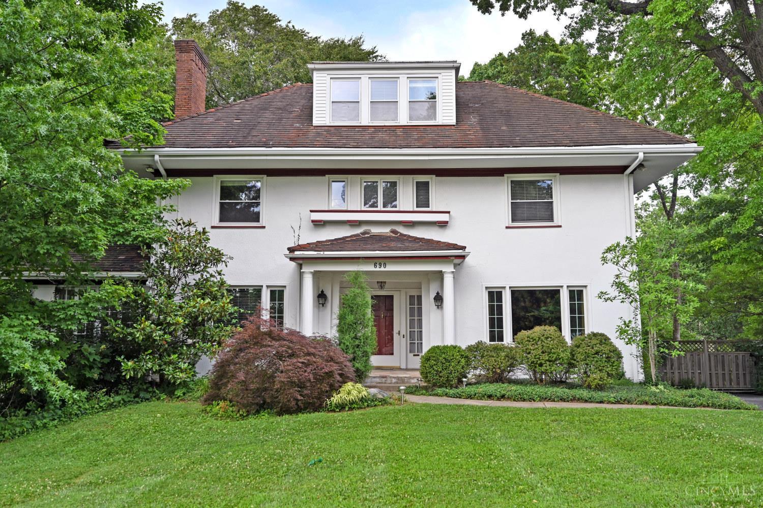 A home w/ heart, history & room to grow in North Avondale. As you step into the warm inviting foyer, you'll feel the soul of this gracious 6-bdrm, 4-bth home. Wood flrs, elegant spaces & rich architectural detail create a sense of timeless charm, while thoughtful updates provide comfort & ease. Coffee in the sun-drenched solarium, surrounded by greenery & light. Host gatherings in the spacious formal dining rm, or cozy up by the fireplace w/ a good book in the living rm. Kitchen updates & is functional/inviting, w/ a hidden walk-in pantry & w/o to the deck for easy indoor-outdoor living. The 2nd flr offers 4 generous bdrms & 2 full baths. The 3rd flr is full of options w/ 2 more bdrms (1 perfect as media/game rm) & a full bath create space for guests, teens, or work-from-home. Zoned HVAC keeps every floor comfortable. Mature trees all around & the N Avondale Rec Center right across the street.  This home is a place to live fully, entertain easily & feel connected to something special.