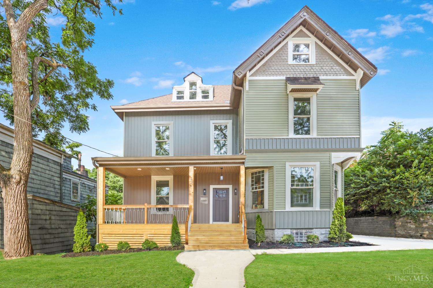 7/27 OPEN HOUSE CANCELLED. Check out this stunning East Walnut Hills home by Urban Modern offers nearly 3,500 sq ft of finished space just a short walk from Eden Park. With 5 bedrooms, 4 full baths & 2nd floor laundry, the layout is functional and spacious. The open floorplan features 12-foot ceilings, new hardwood floors, custom cabinetry & detailed woodwork that blends modern style with historic charm. Major systems are all new, including electrical, plumbing, HVAC, insulation, & finishes. You'll also find quartz countertops, tiled baths and laundry, and high-end fixtures throughout. Outside features include a new driveway, sidewalks, front porch, rear deck, and fenced backyard. Located minutes from downtown and steps to Krohn Conservatory, the Art Museum, and Playhouse in the Park. If it's dining & drinks you're after, nearby favorites include Cafe Mochiko, The Fix, and Alcove by Madtree. Upgrade your lifestyle with this maintenance free, 12-year tax abated home!