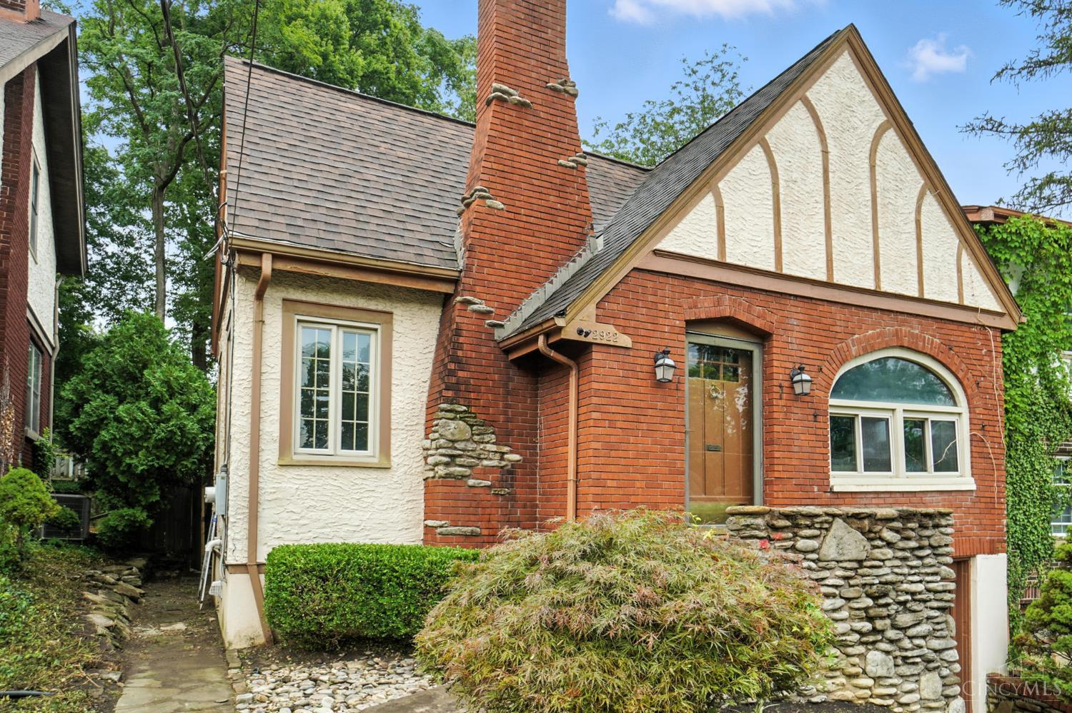 Located on a quiet Cul de sac, this spacious, updated Tudor has beautiful natural woodwork, hardwood floors, a gourmet kitchen, and an oversized 1st floor primary bedroom with sitting room or office.  The partially finished lower level and huge second floor provide many floor plan options, including up to 3 bedrooms, 1 full bath, a recreation room, playroom, or study. Updated mechanics include furnace 2018, and water heater 2023.  Truly walkable, this is a perfect spot to experience all that Mt. Lookout and Hyde Park Squares have to offer!