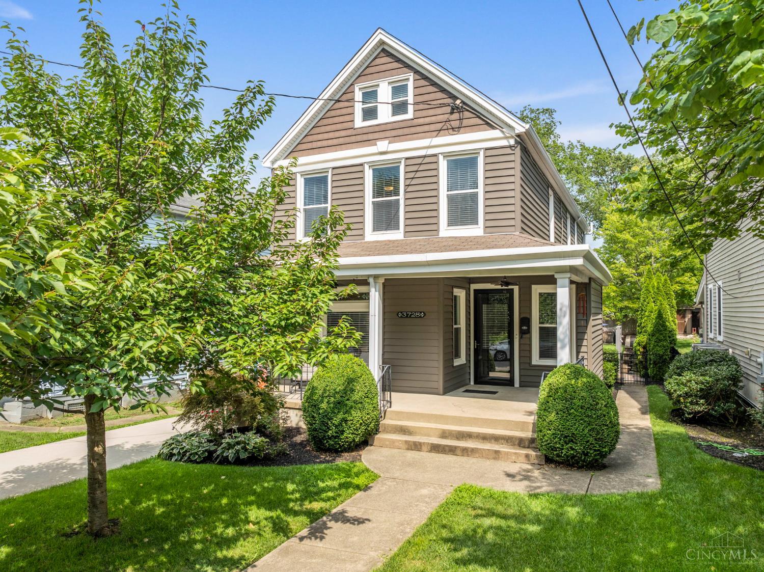 Bright, inviting, & full of charm, this beautifully updated home offers exceptional comfort inside & out. The spacious front porch is perfect for relaxing, while the backyard is an entertainer's dream, featuring a stamped concrete patio w/ a gas fire pit, built-in grill, & outdoor TV. Inside, the expansive kitchen overlooks a private backyard & includes a butcher-block center island & ample cabinet storage. A cozy dining room & family room feature a fireplace & refinished hdwd flrs, creating a warm & welcoming atmosphere. All new wood flooring runs throughout the 2nd and 3rd levels. The spacious primary boasts a luxurious ensuite bath w/ a stunning walk-in shower & a character-rich dressing room w/ 3 closets. The 3rd floor offers a large bonus space w/ a full bathperfect as a second living area, media room, or guest suite. Office space on the 2nd floor. Ideally located just steps from Hyde Park Plaza, Wasson Way Trail, & downtown Oakley. Freshly painted throughout. AC '23. Tax Abtmnt.