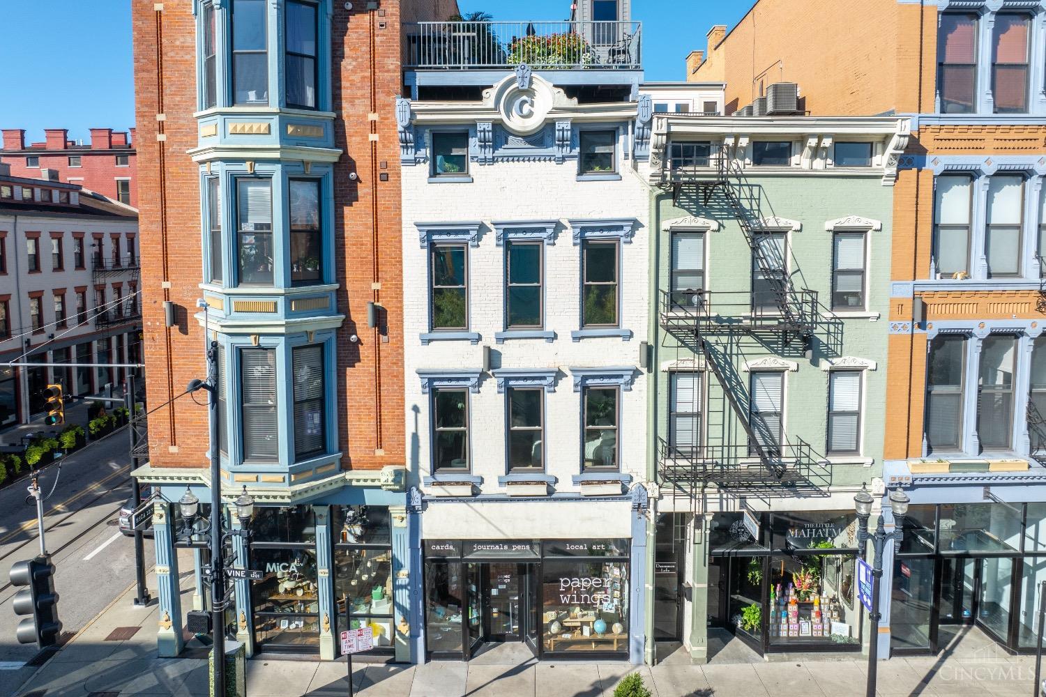 Welcome to urban luxury in the heart of Over-the-Rhine! This stunning 3-bedroom, 2-bath condo spans four levels and features high-end finishes throughout, offering a perfect blend of style and functionality. Enjoy your own private rooftop patio, ideal for soaking in breathtaking city views, private entrances, and a great size basement for storage.  With two assigned parking spaces in a gated back lot, you'll never have to worry about street parking. Located just steps away from OTR's vibrant dining, shopping, and cultural scene, this residence is a true urban gem. Updates include: Custom Closets throughout, Remodeled Bathrooms, New Kitchen Countertops w/ Waterfall Island, New Electrical Work and Painting Throughout. Building offers elevator access to unit.