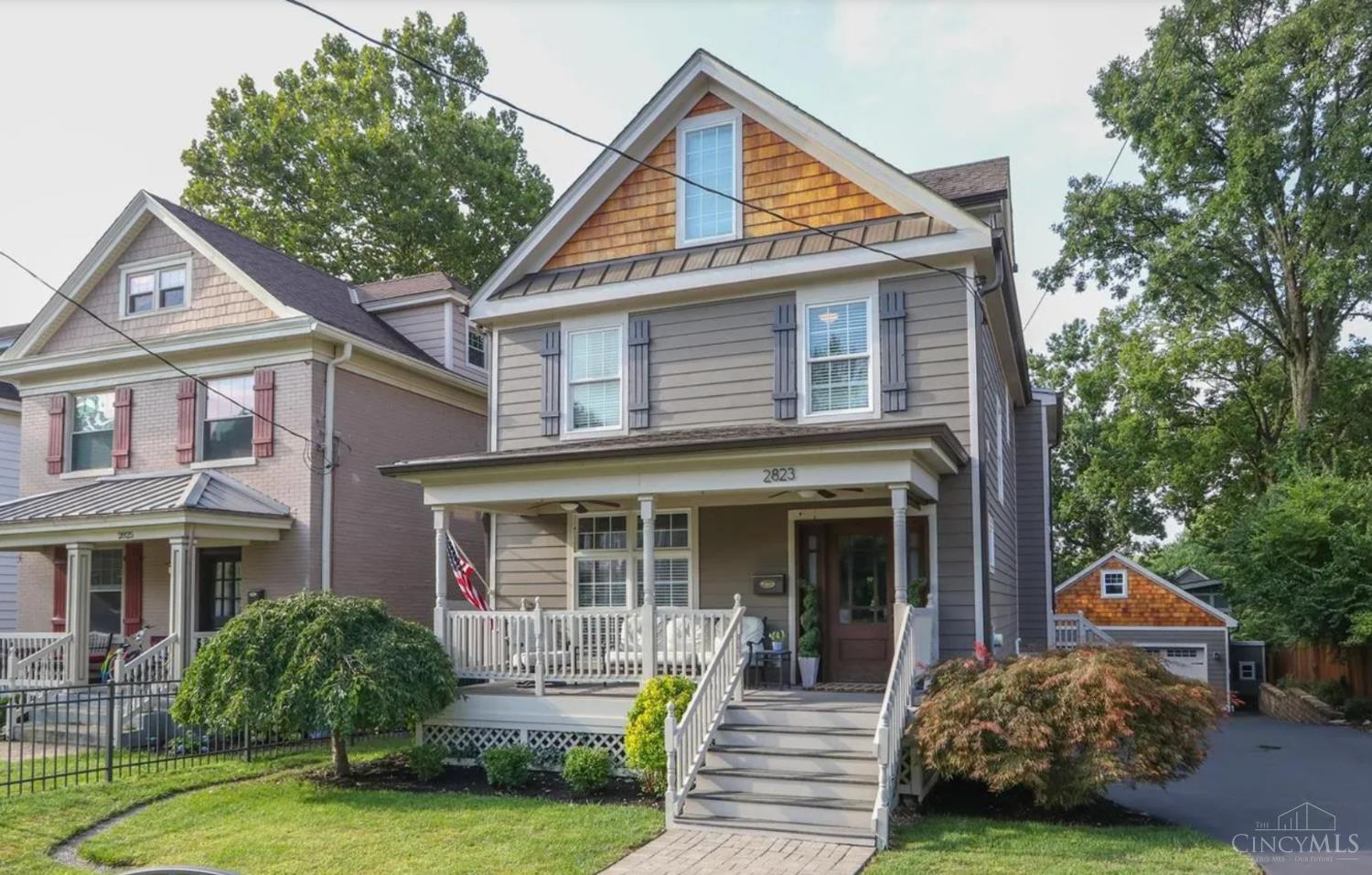 Just a block from Hyde Park Square, this stunning home sits on one of the largest lots on its block and has been fully rebuilt from the studs up with luxury finishes and thoughtful upgrades. It features two spacious family rooms, a flex space in the basement perfect for a guest bedroom, office, or man cave, and a gourmet kitchen with a 6-burner stove, griddle, and custom cabinetry. Solid hardwood floors, glass knobs, and detailed trim add timeless charm. Above the detached garage, a finished space for an office or future ADU. Enjoy a gated front yard and driveway for privacy and security, 3 garages and abundant parking. Behind the walls, you'll find modern upgrades including spray foam insulation, PEX plumbing, a commercial-grade hot water heater, and a water softener. This Hyde Park gem offers both historic character and top of the line finishes. Homeowner is a licensed real estate agent. Square footage doesn't include all finished space. Pavers in back yard can be removed for grass.