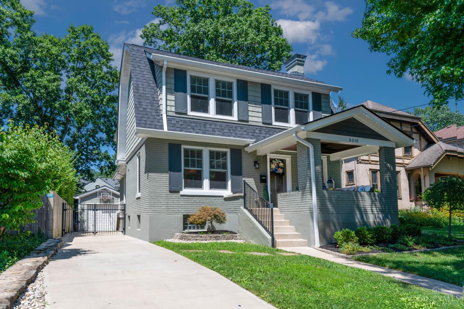 House Beautiful! Timeless charm w/modern amenities! Prime location on picturesque Lookout Drive!  Originally purchased as part of a relo to Cincinnati, the seller ultimately pursued a different opportunity, creating the perfect chance for you to make this home your own! Open-concept layout w/ hardwood floors, oversized rooms, chef's kitchen, mudroom, and study! Generous 11-ft kitchen island, granite surfaces, updated appliances and abundant high-end cabinetry provide functionality and style for family or chic entertaining! Primary suite with ensuite glamour bath includes a walk-in closet with custom organization. Partially finished lwr level offers a large recreational space, wet bar, exercise rm, and full bath! Newer Pella Windows, dual HVAC, & 2nd fl laundry. Exterior features incl a charming paver patio, covered front porch, private fenced backyard, and a newly built detached garage - ideal for relaxing or hosting! Just minutes to Mt Lookout Square/Restaurants/Coffee/Shops & More!