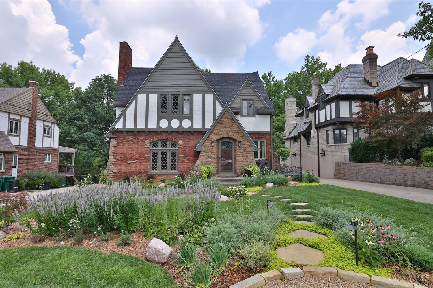 Amazing Tudor home in the ideal Mt. Lookout location! This home boasts 3 bedrooms, 2.5 baths, 1st floor study, 2 car garage and great flat backyard. This home exudes charm with it's gorgeous hardwood floors, sunken living room, arched entryways, natural woodwork, leaded windows, & gourmet kitchen. Up-dates include new roof, driveway, landscaping, sprinkler system, many new windows, and new HVAC in 2019! This home is just blocks to Mt. Lookout Sq, multiple parks and schools. It is not to be missed!