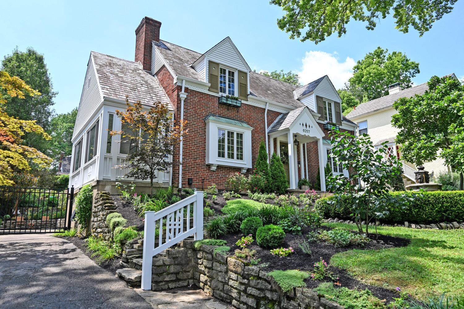 Impeccably maintained and expanded to 3,100 sq. feet of Luxurious Updates. Breathtaking, Landscaped gardens and lighting. Fireplaced Living Room with original, Wide Planked Oak floor leads to a 7' X 17' tranquil Sunroom. Gourmet Kitchen with new Refrigerator, Stove, Dishwasher, Disposal & Microwave. A 12' X 18' Great Room off Kitchen with wall of glass, access to tiered deck, incredible view of terraced back yard and iron pergola. Spacious BRs. Custom designed Baths.  Heated Floor in 2nd floor Bath. 2nd Fl Laundry, with new Washer. Hardwood floors throughout. Stunning outdoor space ideal for entertaining. Basement with newly finished family room and additional storage. Access to garage and workshop. New HVAC and Water Heater.