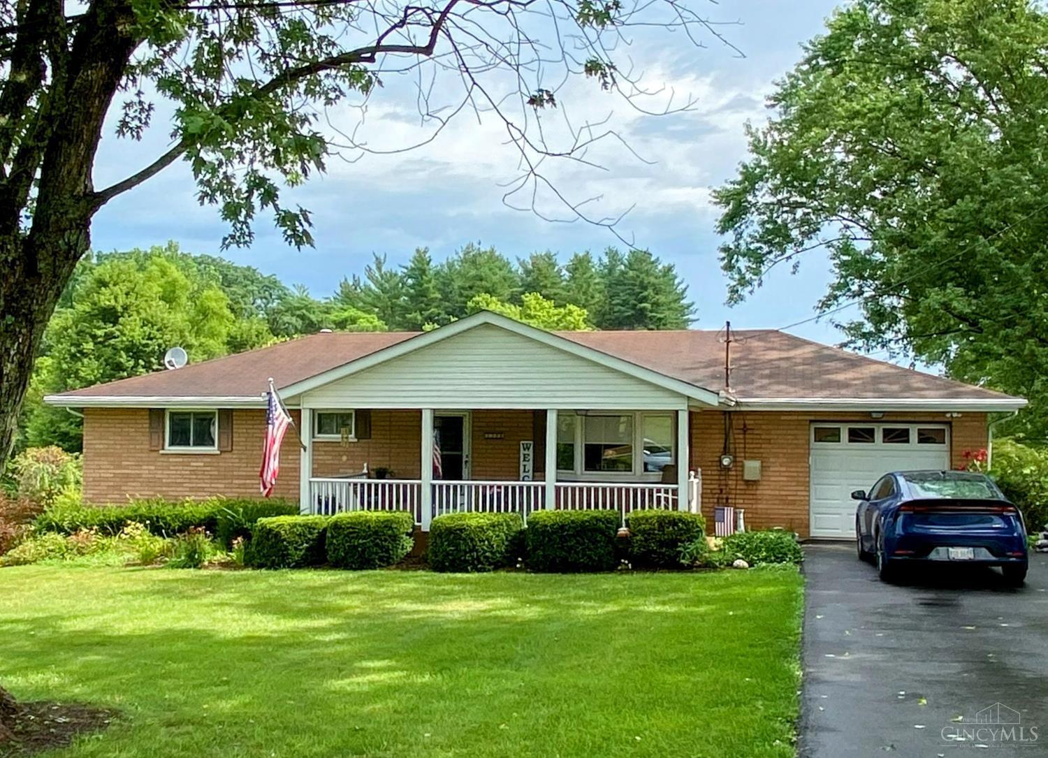 Pride of ownership shows in this beautiful cozy brick ranch in the Ross School District. Enjoy amazing views from both the front porch swing and the tiered deck off of the kitchen. Yard is beautifully landscaped and mature trees provide lovely shade...lower level walkout to deck. Pella doors and windows. Beautiful original hardwood floors.   All newer stainless kitchen appliances and wash/dryer stay. Brand new furnace and AC.    Don't let this one get away!