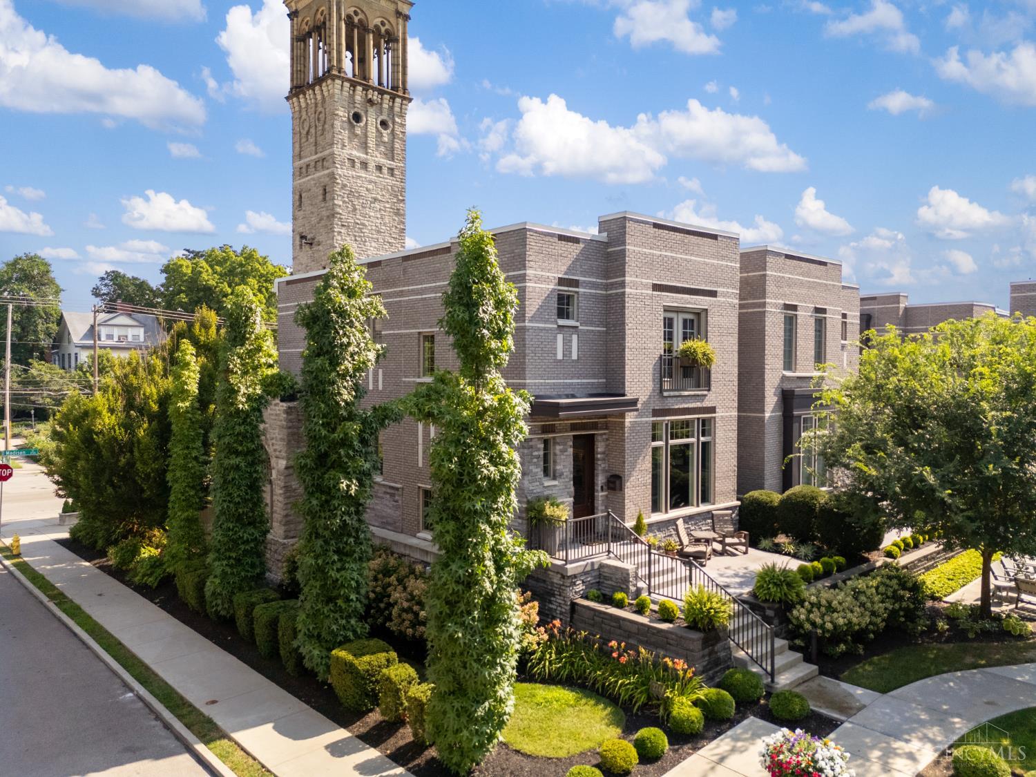 Welcome to 2740 Cleinview Ave! World-class 2BR/2.5BA townhome! Original owners! Custom-built in the exclusive Sanctuary Court community in East Walnut Hills. Benefit from a $400K LEED Silver tax abatement thru '33! Backing to the preserved church belltower, this home offers privacy, charm & distinctive architectural character. Chef's kitchen features custom cabinetry & full-wall brick accents, flowing to dining area & reclaimed wood bar (23)ideal for entertaining. Study includes heated floors, exquisite Dalle de Verre stained glass & built-in cabinet! Mirrored in stairwell. Upstairs offers spacious primary suite & generous 2nd BR, each w/ ensuite baths & custom closet organizers. LL offers ample space for entertaining/recreation. 2-car garage w/ epoxy floor (19) & EV hookup wiring. Updates: new carpet/paint (25), sprinkler (22), closet shelving, deck faucets & hideaway screen doors (20). Moments to Woodburn Ave, Eden Park & the best of East Walnut Hills.