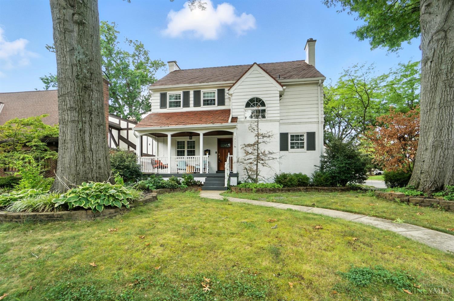 This charming 3-bedroom, 3.5-bath two-story home blends timeless charm with modern convenience. From the elegant archways and detailed crown molding to the spacious living room with a cozy fireplace, every corner exudes warmth and character. The kitchen flows through the butler's pantry into the dining room with walkout to deck, ideal for indoor-outdoor living. A convenient first-floor half bath adds functionality. Upstairs, the primary suite offers a beautifully updated en-suite bath with double vanities. The finished lower level with walkout includes a family room & study, providing flexible living space for work or play. Plus, enjoy the added value of a coveted 1-car oversized garage.