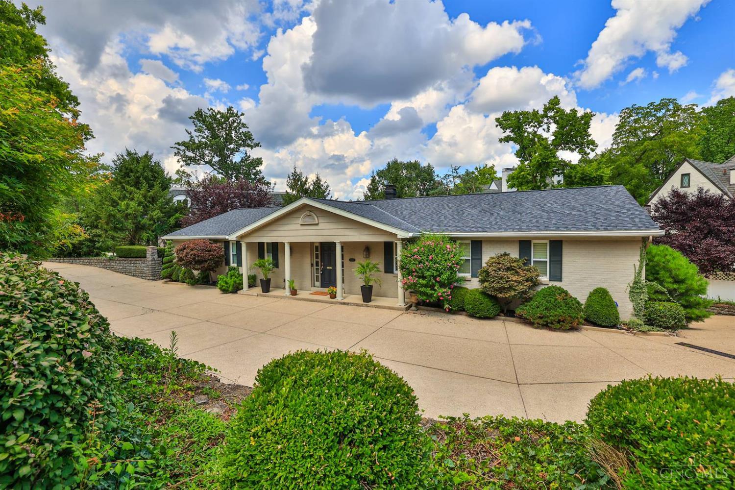 Hyde Park Lifestyle with a Rookwood Address! Experience light-filled living with hardwood floors & open spaces throughout. The family room features custom built-ins & a cozy fireplace, while the spacious sunroom offers walls of windows with tranquil views. The kitchen is perfect for gatherings with a center breakfast island, & stainless-steel appliances. The primary suite includes an en-suite bath & a full wall of closets. The finished lower level continues the hardwood floors & offers French doors to an enclosed porch & is ideal for a second family room, & rec area. A convenient half bath, bonus room, & ample storage complete this level. Enjoy lush landscaping, a charming patio, & a screened porch, plus a spacious 2-car garage. All just minutes to Hyde Park Square & the weekend farmer's market. Private, serene, & perfectly located! All offers left open 48 hours, no escalation clauses. Seller prefers quick closing.