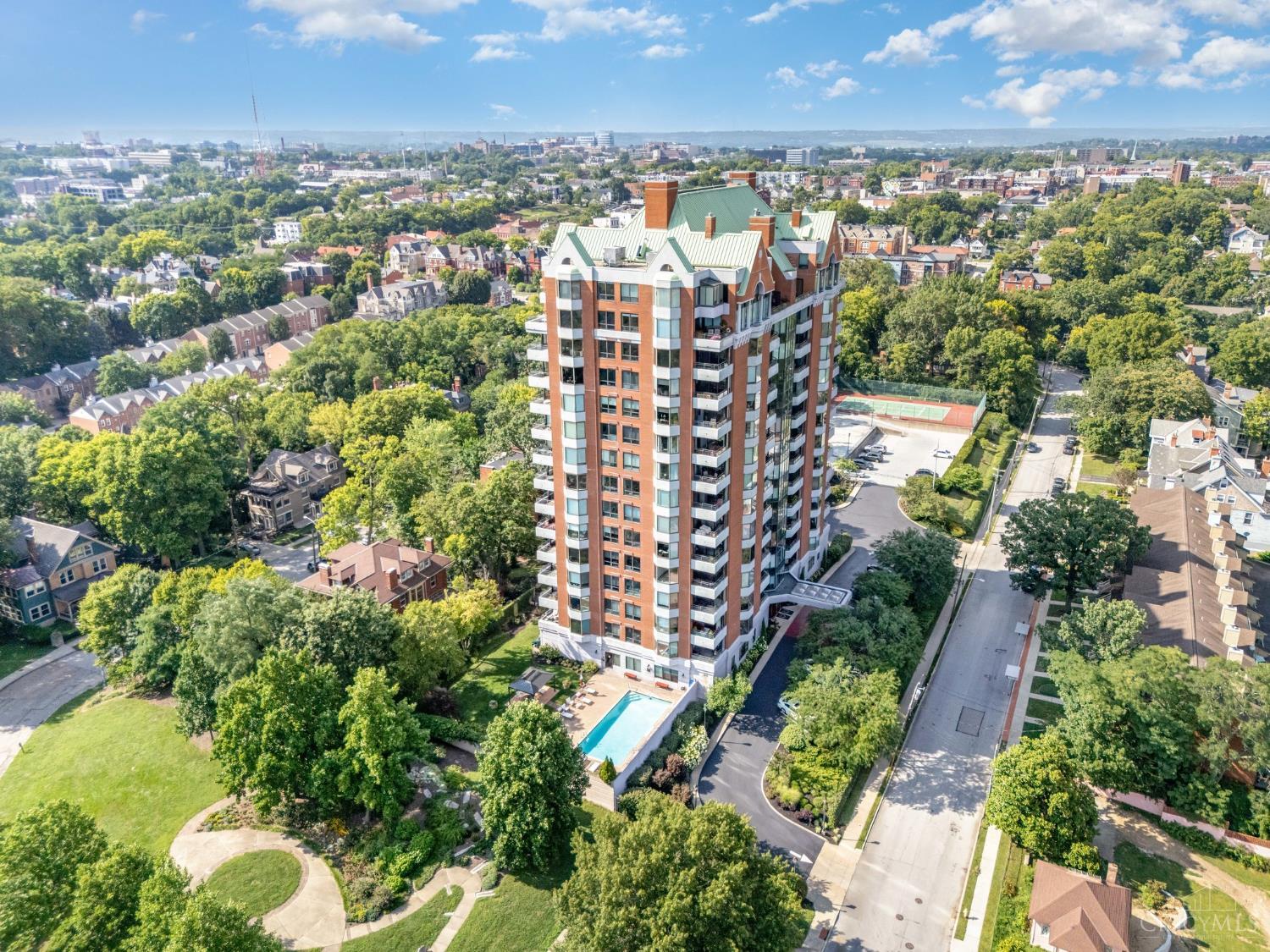 Luxury meets location- Stunning 1,824 SF 14th-floor condo at St. James, Eden Park. Floor-to-ceiling windows & balcony showcase the Ohio River, Downtown & KY hills. Private elevator, fireplace, Acacia hardwood, Cambrian wood cabinets, Kitchen Aid appliances, granite countertops. Primary suite w/walk-in & spa bath. Building amenities offer a new level of lifestyle that include porte-cochere, 24-hr doorman, concierge, pool, fitness center, tennis courts, event space, guest suites, 2 garage spaces, and 2 storage units. Steps to Eden Park, Art Museum, Krohn, Playhouse, and Mt. Adams breathtaking day & night views.