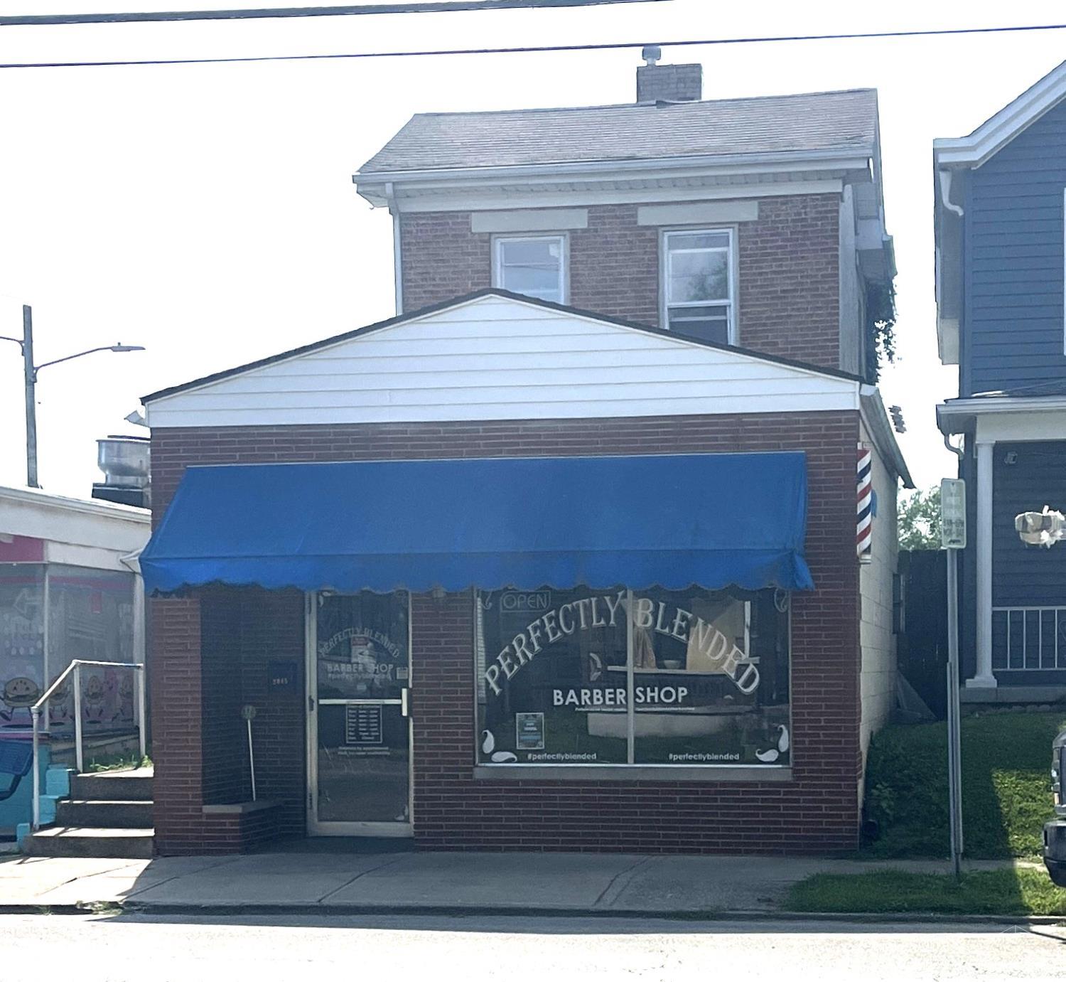 Here's your next investment property - $1800/month income! Mixed use property with 404 sq ft commercial space currently used as an established barber shop, and 1216 sq ft single family 2-story with 3 bedrooms, 2 full baths, partial basement & fenced yard. Single family renovated in last few years with all new lvp flooring, drywall (ceilings & walls)in kitchen, baths & living room, recessed lighting, new kitchen cabinets, counters and both baths.  Still needs tlc and is being sold as-is.  Seller will do no more repairs.  Tenants pay all utilities except water/sewer. Minimum 24 hour notice to show.