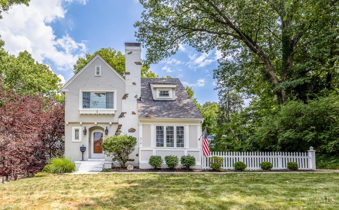 Storybook Tudor nestled on sought-after Tweed Avenue in the heart of Mt. Lookout*Tastefully updated w/the character of its time well preserved*Hardwood floors throughout*Bright, sun-filled spaces*Practical open floorplan*Updated KIT w/crisp white cabinetry, granite countertops, stainless appliances adjoins well-appointed dining room*Spacious living room w/custom built-ins adjoins cozy & versatile den/study*Convenient first floor powder room*Spacious primary BR*Excellent closet space including large walk-in + cedar closet*Primary BA w/oversized soaking tub*Built-in 1-car GAR*Spacious rear deck overlooks rear yard w/mature trees offering lush privacy*Prime Mt. Lookout location steps from Mt. Lookout Square, schools, parks & more.