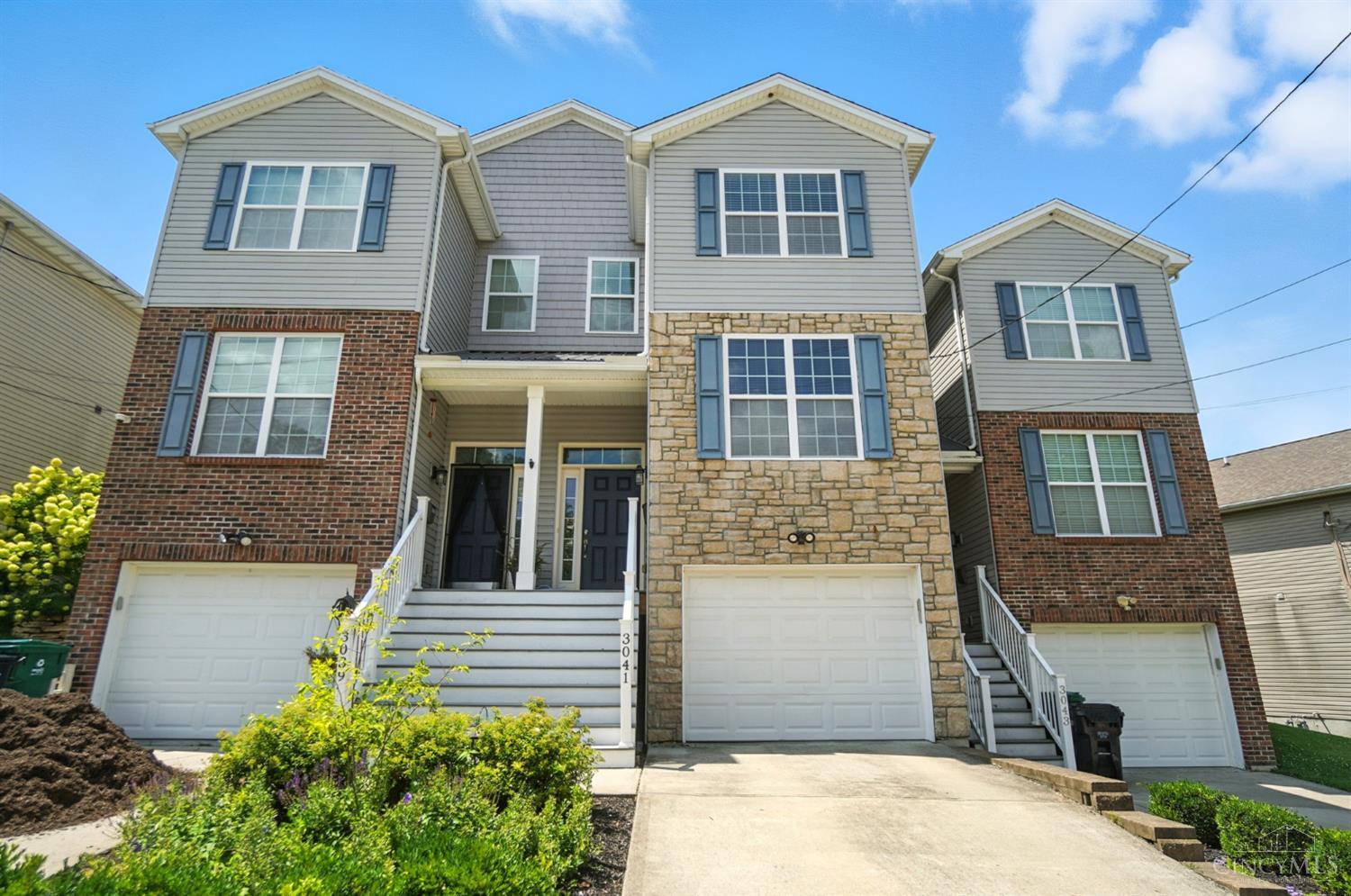 LEED Gold certified like NEW construction! The benefits of energy efficiency and super LOW property taxes that are not back to payable until 2031! Plus NEW carpet, fresh paint, open floor plan, 1st floor study, 2nd floor laundry, finished lower level w/full bath AND private paver stone terrace that is walking distance to O'Bryonville, parks and E. Walnut hills business district!