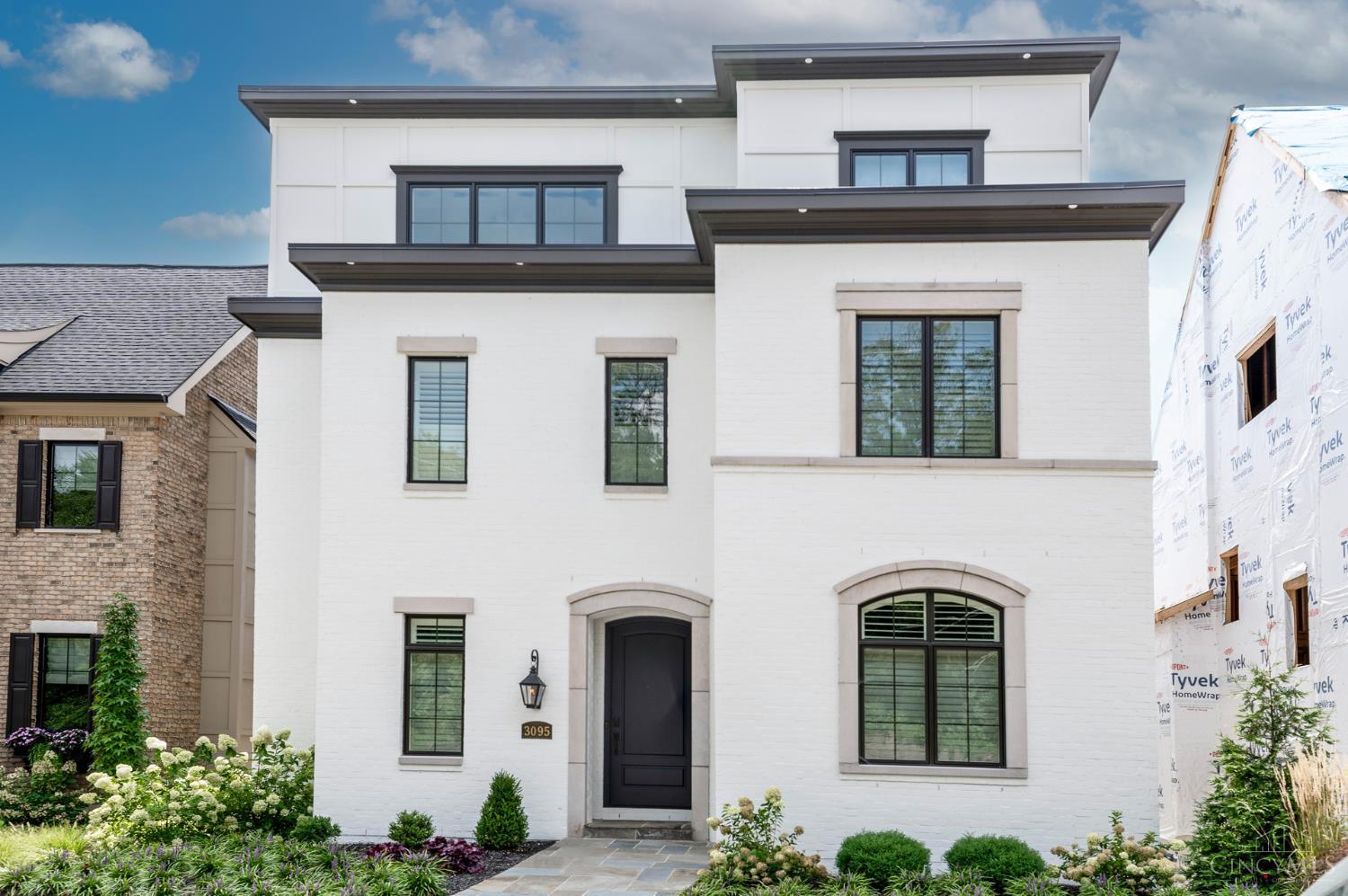 Exceptional attention to detail throughout this like new Walworth Junction 4 story town home! Over 4700 sqft - 2 private decks- stunning river views- 12' entertainers wet bar - coiffered ceilings - 3 car garage - elevator - 2 walk-in primary closets plus rare 2 primary baths! Zoned HVAC - Whole house generator -tax abated til 2038 - 3rd floor family room w/ full kitchen opens to spacious deck! Hardwood floors on all 4 floors. This property has it all. Possession after October 1st. Leave offers open for 48 hours- sellers reserve the right to accept an offer prior. No escalation clauses.