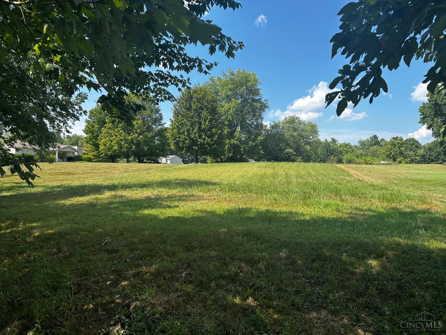 Excellent opportunity to build on a large, flat lot in the private Lake Lorelei community. Located on a tree-lined street just one-half block from the lake, by Recreation Area C.  Enjoy all that the community offers - gated entry, 3 lakes, clubhouse, 2 beaches, fishing, and marina. Just 35 miles from downtown Cincinnati it is perfect for year-round living or to use for a weekend getaway.