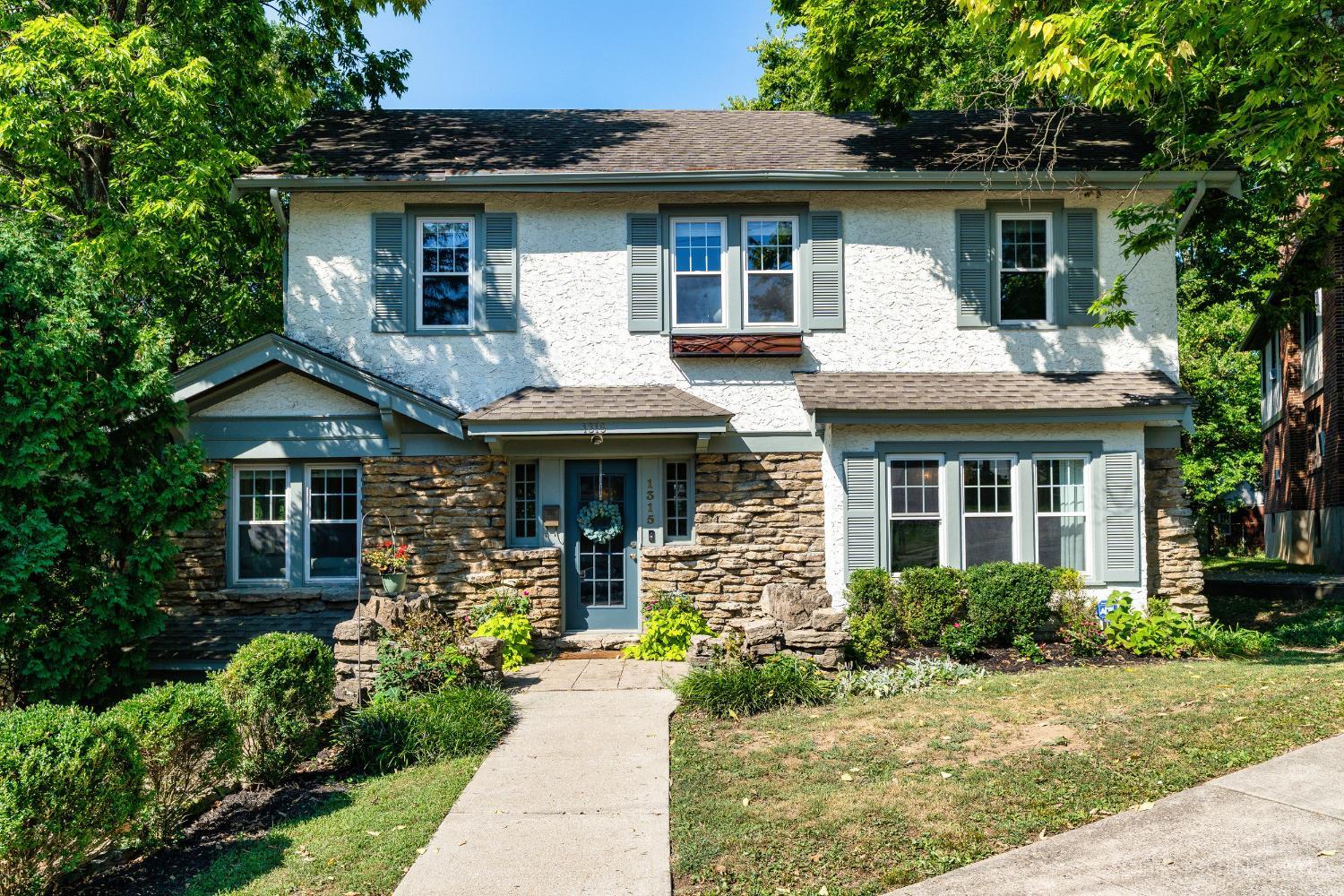 Beautifully renovated home on charming street nestled in between Hyde Park & Mt. Lookout Square! Open concept first floor plan includes bright, renovated kitchen w/ granite counters & brand new SS appliances, half bath & huge living room w/ tons of windows/natural light, new hdwd floors & wood burning fireplace. Updated bathroom, fully fenced in spacious back yard with deck, shed, gated gardens, tons of perennial flowers - great for entertaining. Interior has been beautifully updated with wallpapered accent walls, modern lighting, neutral paint, backsplash, open shelves, etc. Full bath updates in 2025, kitchen updates in 2024, A/C 2017, Roof 2015, windows 2015, HWH 2016.
