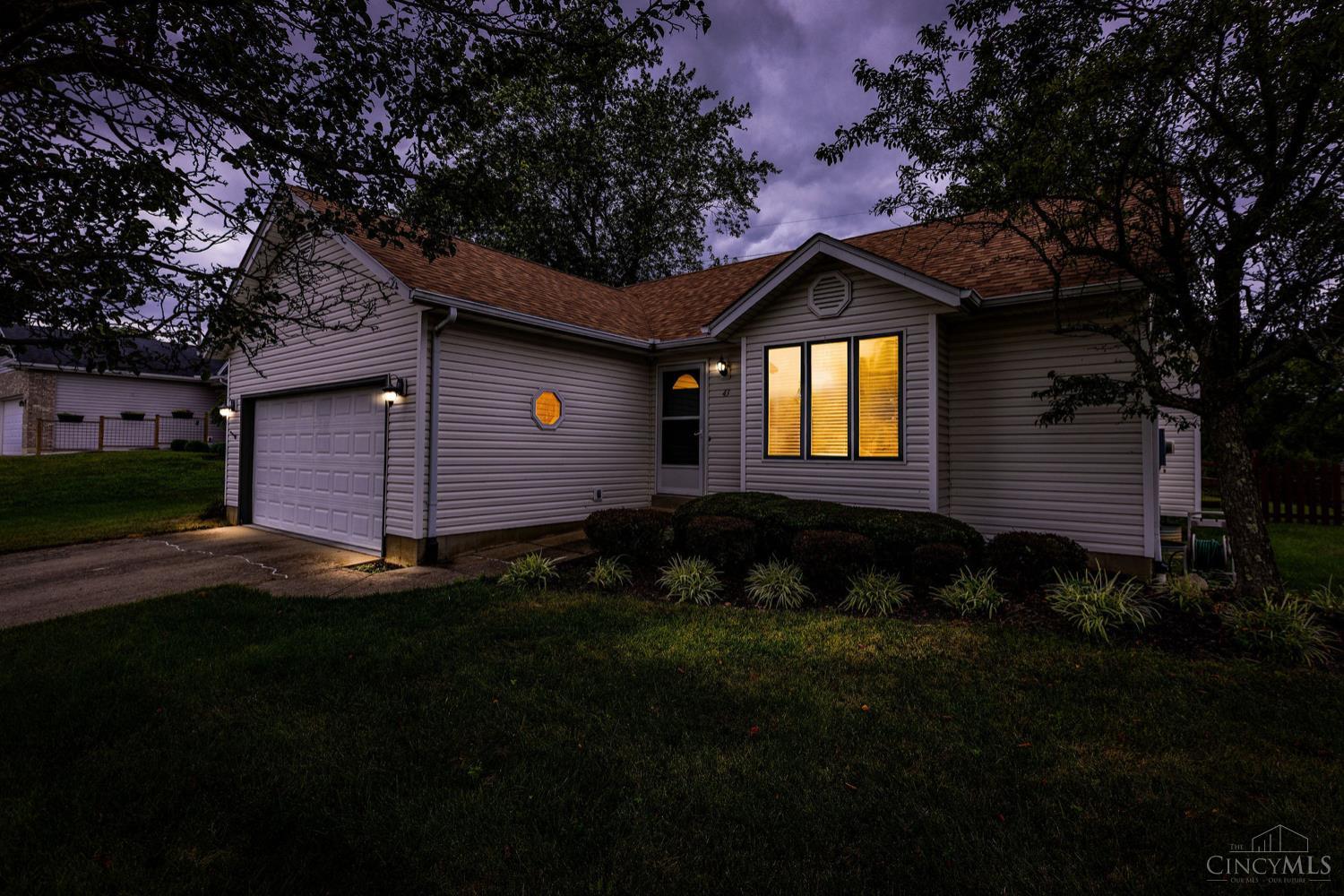 Escape to your own private retreat! This charming three-bedroom, two-full-bath home offers the perfect blend of comfort and style. The open floor plan creates a bright, airy atmosphere, with a central living room featuring a cozy gas fireplace, perfect for relaxing evenings. The kitchen, with its elegant solid surface countertops, is both beautiful and functional.    The true highlight of this property is the scenic, private backyard. Step outside to the covered patio, an ideal space for al fresco dining or simply unwinding while taking in the serene views. A newer roof provides peace of mind, and the full, unfinished basement offers endless possibilities for customizationimagine a home gym, a media room, or a workshop.    A two-car garage adds to the home's practicality. This property combines tranquility with modern living, making it the perfect place to create lasting memories.