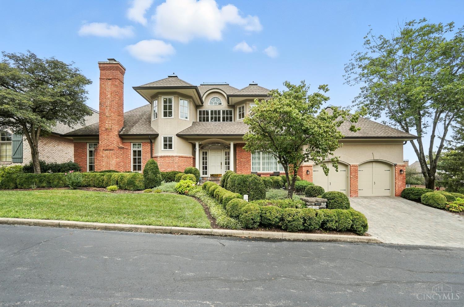 Wonderful sun-filled 5200 sqft custom home on peaceful Hampton Court cul-de-sac, meticulous maintained and updated! Home feature high-end updates by JA Smith, Auer Kitchens, and Drawing Dept, including a gourmet 20' cook's kitchen and a luxurious first floor primary suite with a spa bath and walk-in California closets. The primary suite walks out to a deck and features a cozy sitting area. There are two large second floor bedrooms, each with en suite bathrooms, with the hallway overlooking the gracious two story entry foyer. The finished lower level has high ceilings that walks out to a shady patio. Full sized windows abound. There is a large media/family room and a recreation space large enough for a pool  table. There are two large bedrooms with ensuite bathrooms, each with doors to the patio. The neighborhood consists of 3 private cul-de-sacs, plus a community pool. Please leave offers  open for 48 hours; the seller reserves the right to accept an offer prior. No escalation clauses.