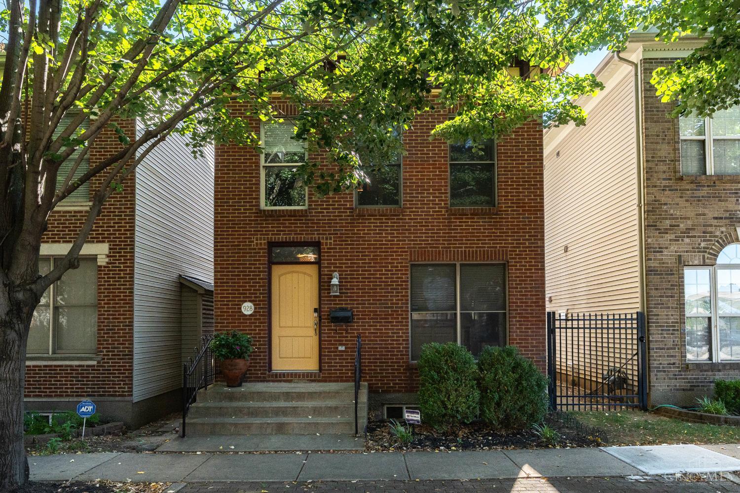 Live where the city comes alive! Just blocks from FC Stadium, Washington Park, Music Hall, and surrounded by restaurants, entertainment and nightlife, this home keeps you in the center of it all! Inside, you'll find three finished levels plus a full unfinished basement for storage or future expansion. The third-floor bedroom is a perfect flex space  use it as a home office, gym, craft studio, or whatever fits your lifestyle. The first floor's open and bright great room was made for entertaining. A stylish kitchen with a counter bar and stainless appliances flows seamlessly into the dining room and living room, complete with a cozy gas fireplace and a wall of windows that flood the space with natural light. Step outside to your private deck for an evening with friends or a peaceful afternoon soaking up the sun. A convenient detached 2-car garage makes for easy parking. This home checks every box for an easy city lifestyle - space, convenience, and fantastic location!