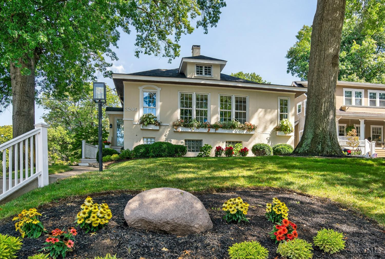One of a kind fully renovated Craftsman style home in Hyde Park. Open concept first floor plan includes bright, renovated kitchen, hardwood cherry-plank floors, large living area with lots of windows/natural light, and original rookwood tile gas fireplace. French doors lead out to large Timber Tech deck with TV, sound system and electronic louvered roof extending all-weather entertainment area. Master bedroom has spacious walk-in closet.  Three full bathrooms, all updated. Custom blinds throughout the home.  Finished activity and laundry rooms in lower level. Lower level is dry.  Plumbing and electrical have been updated. Lots and lots of extra storage space throughout the home. Attached single car garage with additional parking in driveway.  New  exterior paint and updated box gutters. Exterior lighting, sprinkler system, and refreshed landscaping. Walking distance to Ault Park and the Observatory.