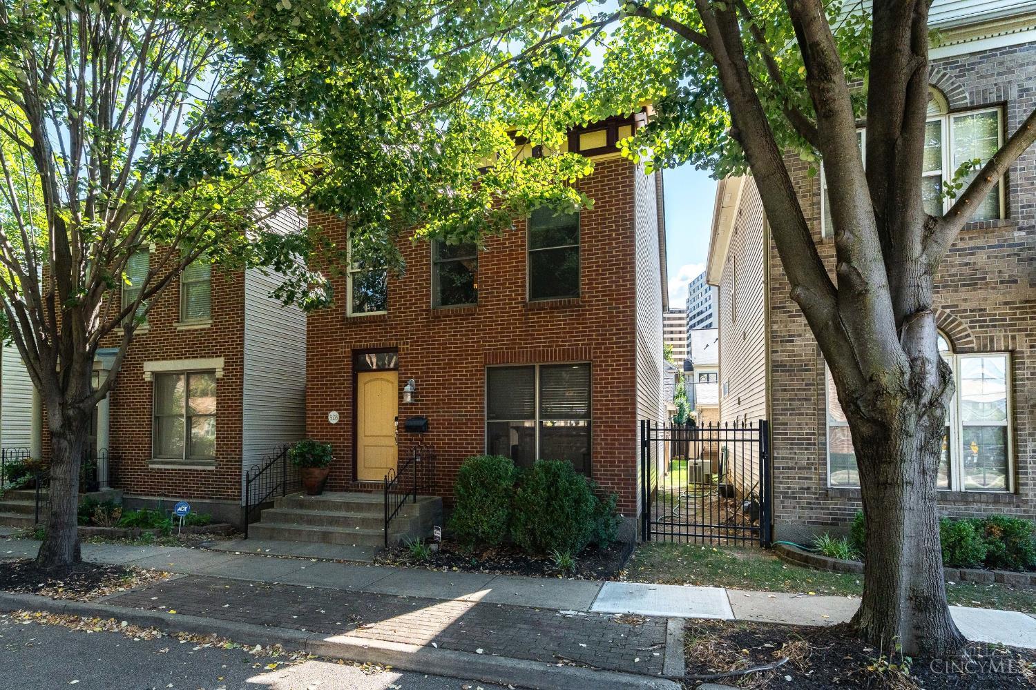 Live where the city comes alive! Just blocks from FC Stadium, Washington Park, Music Hall, and surrounded by restaurants, entertainment and nightlife, this home keeps you in the center of it all! Inside, you'll find three finished levels plus a full unfinished basement for storage or future expansion. The third-floor bedroom is a perfect flex space  use it as a home office, gym, craft studio, or whatever fits your lifestyle. The first floor's open and bright great room was made for entertaining. A stylish kitchen with a counter bar and stainless appliances flows seamlessly into the dining room and living room, complete with a cozy gas fireplace and a wall of windows that flood the space with natural light. Step outside to your private deck for an evening with friends or a peaceful afternoon soaking up the sun. A convenient detached 2-car garage makes for easy parking. This home checks every box for an easy city lifestyle - space, convenience, and fantastic location!