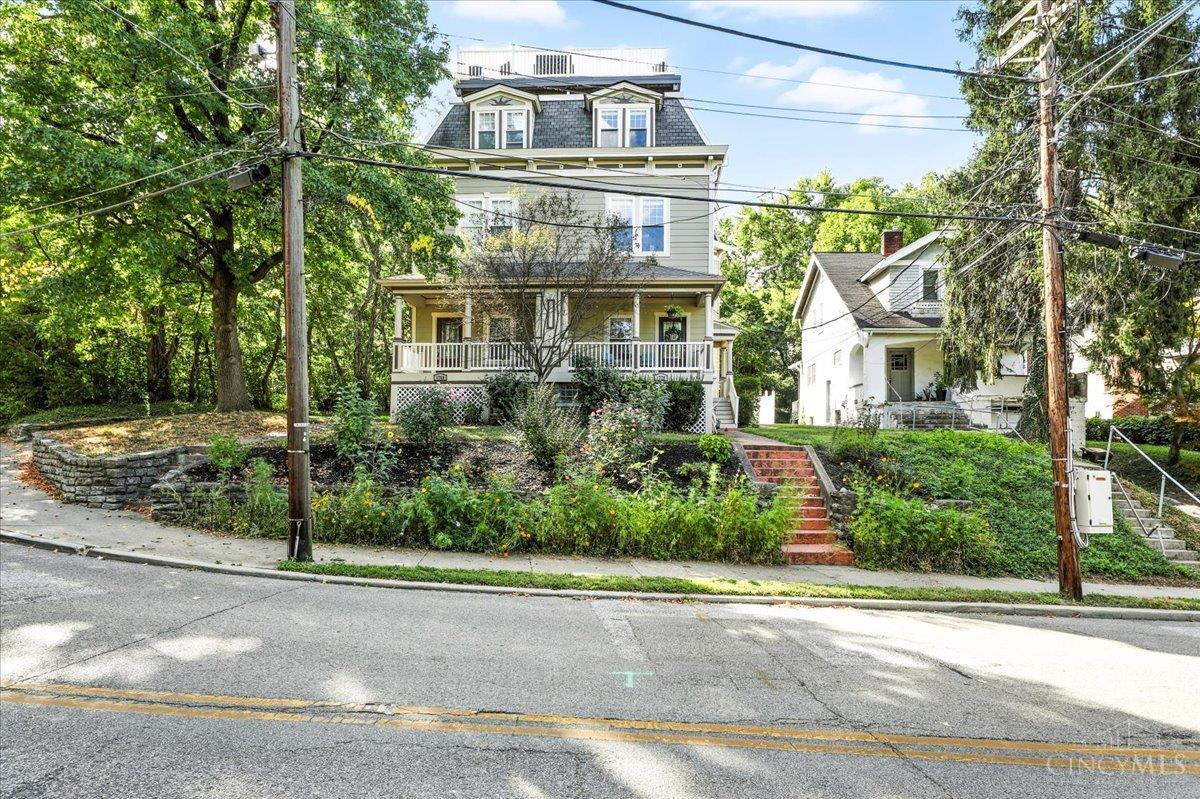 If a rooftop river view is on your wish list, your search ends here. This residence invites you to indulge in outdoor living on two elevated decks, a backyard patio, or the charming front porchall offering a serene escape from the city's pace, yet only minutes from downtown, premier parks, dining, and boutique shopping.    Inside, the first-floor design is both grand and versatile, setting the stage for elegant holiday dinners, sophisticated entertaining, or spirited game-day gatherings. Spanning nearly 2,200 square feet, this duplex lives like a distinguished single-family home, enhanced by a private elevator seamlessly connecting the first and third floors. Whether you're preparing a chef-inspired meal in the gourmet kitchen or savoring carryout by the fireplace, every detail of this home blends comfort, convenience, and understated luxury. Welcome to a lifestyle where refinement meets relaxation. 2-car detached garage and ample parking.