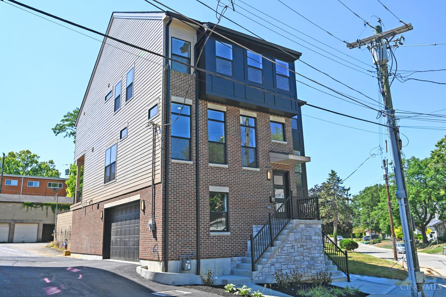 Stylish, Sustainable & Low-Maintenance Living! Final Phase, Only 2 Left! LEED Gold w/15-yr tax abatement, this home combines modern design, efficiency & minimal upkeep. Gourmet kitchen w/quartz counters + SS appliances, spacious rooms & open layout flow seamlessly to deck for bonus outdoor living. Superior craftsmanship, beautiful finishes & 2nd-flr laundry add everyday ease. Filled w/natural light & thoughtfully designed for today's lifestyle. Prime location convenient access to Oakley Sq, Wasson Way Trail, or reach Rookwood, I-71, dining & shops in mins. A chance to own sustainable style + convenience in the heart of it all! Seller is OH licensed agent.