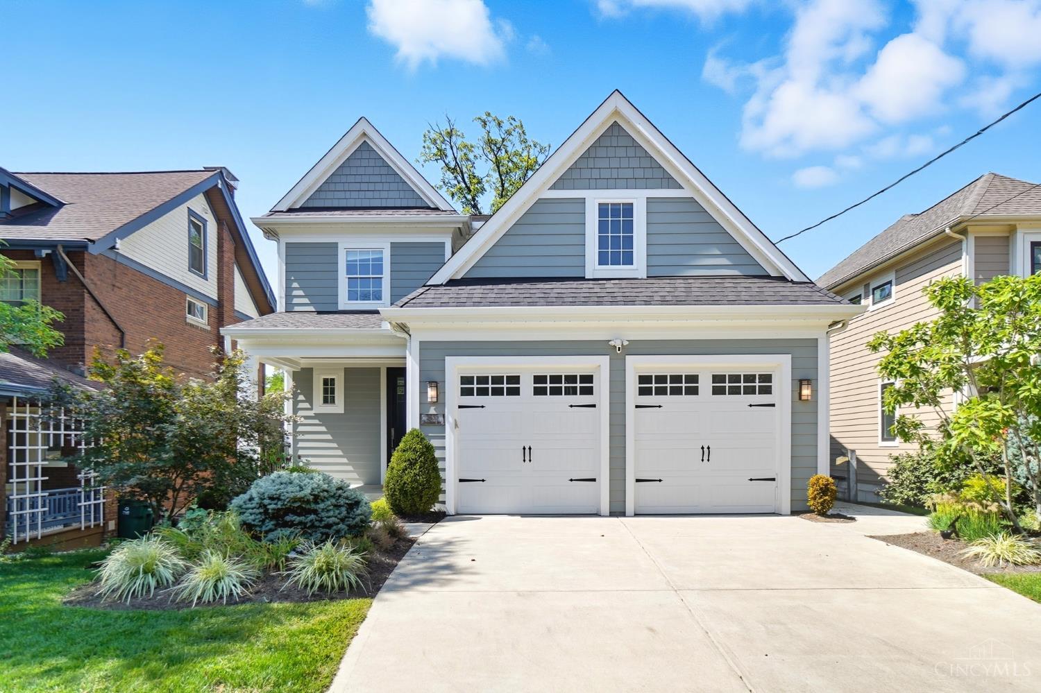Welcome to 3633 Stettinius Ave. This stunning 5 bedroom, 3.5 bath custom-built home in Home Sweet Hyde Park is Tax abated until 2032! The open-concept first floor features a gourmet kitchen with granite countertops, a spacious island, abundant wood cabinetry, stainless steel appliances, and a large dining area highlighted by a beautiful chandelier. Hardwood floors flow throughout, with sliding doors leading to a back balcony, plus a powder room and mudroom with planning desk. The lower level offers a private bedroom, full bath, wet bar, and walkout to the back patio perfect for guests or entertaining. Upstairs, enjoy second-floor laundry, four bedrooms, and a versatile great room for an office or playroom. The primary suite includes wall-to-wall carpet, walk-in closet, and a luxurious bath with granite double vanity and walk-in shower. All just around the corner from Hyde Park Square's shops and restaurants!