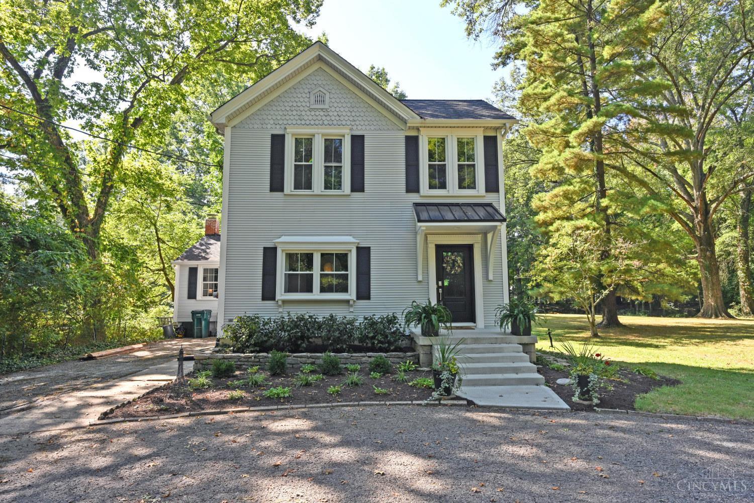 Coming Soon-Historical 2 story aluminum siding built 1901-located on 2.078 acres very usable with many trees (lovely setting) in cul de sac of private drive. Hardwood throughout. Refinished by Finishing Touches 2014, updated LR with gas fireplace, dining room chandelier with walkout to deck, kitchen with 42 cabinets, 36 Italian range, removable island, adjoining washer & dryer*Full bath 2016/17, FR with woodburning fireplace, tile floor walkout to deck. 2nd floor-3/4 bedrooms (4th could be study). Roof 2016/17, gutter guards 2023, basement waterproofed 2020-2025, windows & sliding door in DR 2016/17. New gas line added 2016, deck replaced plus 1 added 2023. Galvined pipe in basement replaced with PEX, septic pump 2022-pumped 2024. New front door 2021. All ducts cleaned 2024. Must see! Walking distance to schools, recreation center & pool. Short walk to Mt Washington for library, banks, Kroger, Walgreens, restaurants & Water Tower. 15 minutes from downtown and CVG.