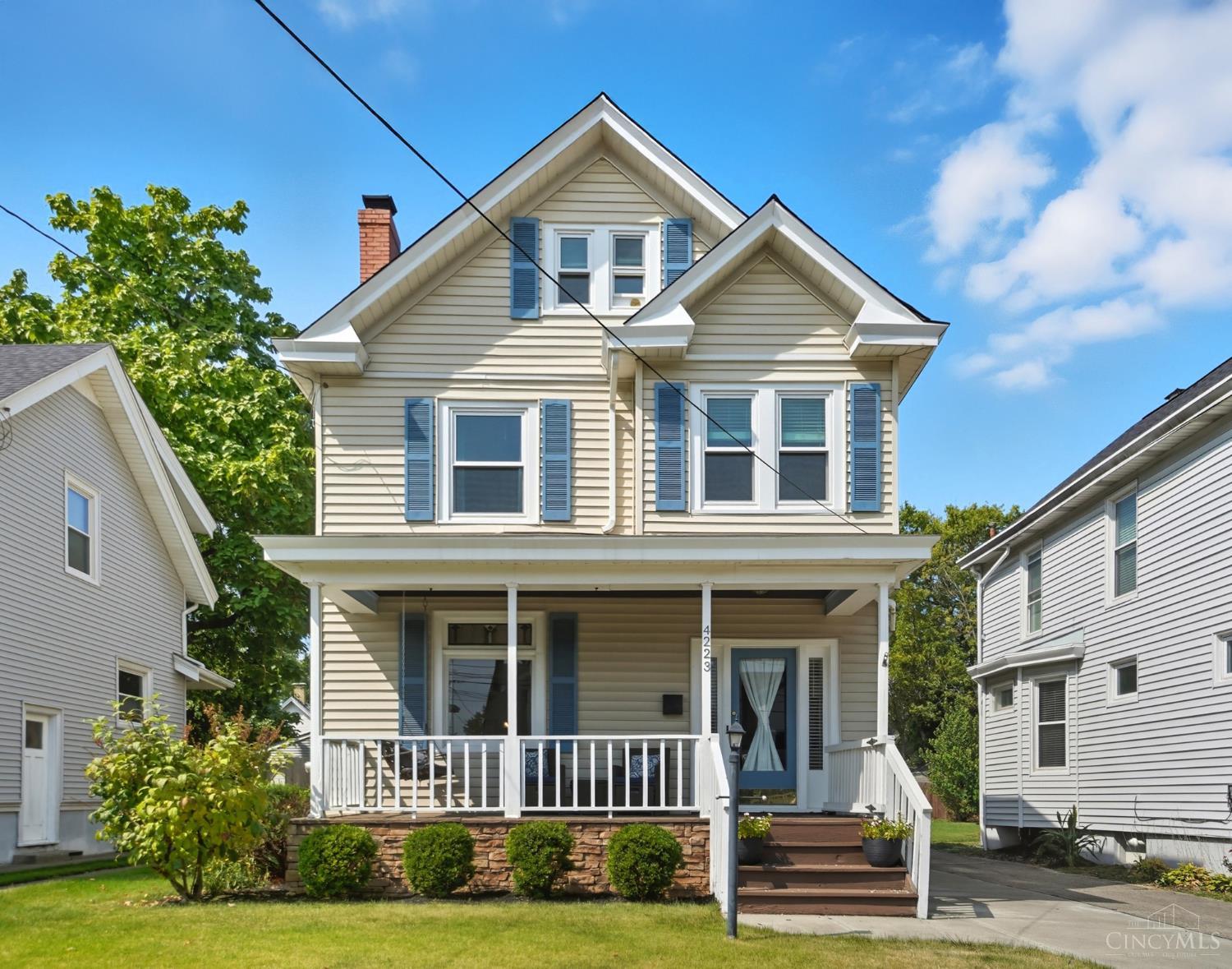 This beautifully renovated 3-story home perfectly combines classic Oakley character with today's modern updates. Offering 4 bedrooms and 1.5 baths, the home features hardwood floors, 9-ft ceilings, exposed brick accents, and a rare 2-car garage. The 2023 kitchen renovation shines with quartz countertops, new appliances, and seamless flow into the dining and living areas. A freshly retiled fireplace with a new gas ventless insert anchors the first floor, while the updated upstairs bath offers quartz counters and stylish finishes. Recent upgrades include fresh paint, new carpet, lighting, Gilkey windows, and a smart thermostat. Practical updatesroof & gutter care, enhanced electric to patio/garage, HVAC tune-up, and a new washer/dryeradd peace of mind. Step outside to a private fenced yard with a paver patio, built-in fire pit, and lush landscapingperfect for entertaining or relaxing. All this, just steps to Oakley shops, Factory 52, and the Wasson Way trail!