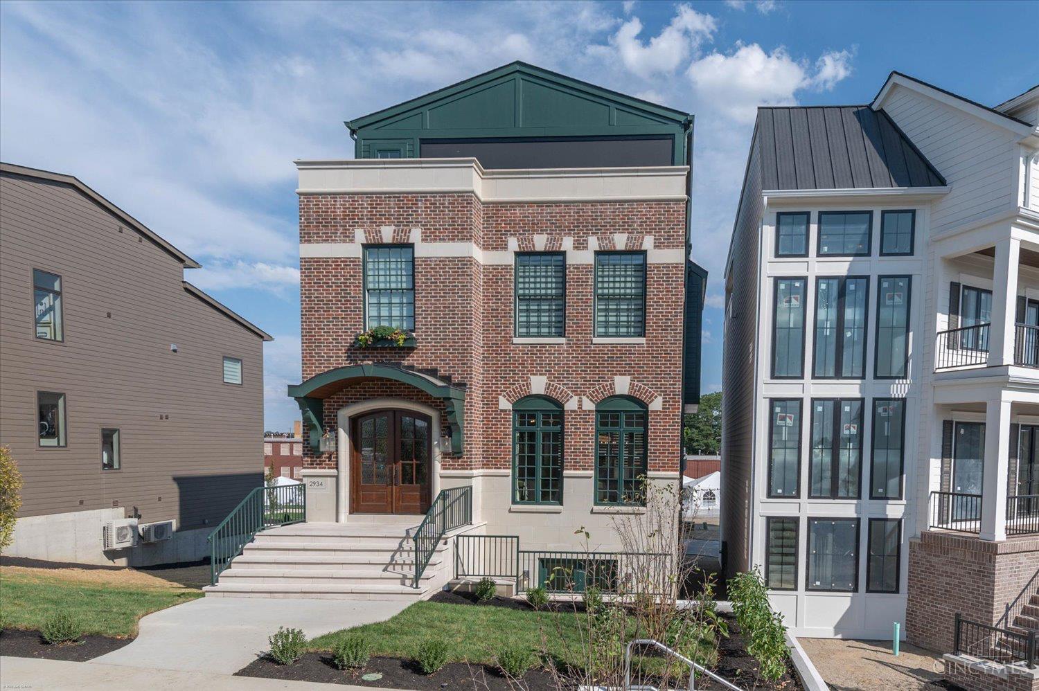 Built by Heritage Building Group, this Homearama 2025 home at Foundry Park blends luxury & sustainability in the heart of Oakley.   Open floorplan features a fireplace & gourmet kitchen w/ high-end finishes. The finished LL is perfect for entertaining w/media room & wet bar, while the elevator adds ease to each level. The primary suite offers a soaking tub, walk-in closet, & 2nd-flr laundry. Third floor boasts a rec room, 2nd wet bar, covered/open rooftop deck, & half bath.  Enjoy a 15-year LEED-certified tax abatement while living steps from Oakley's best spots. Don't miss this rare chance to own a home built for entertaining & sustainable living!