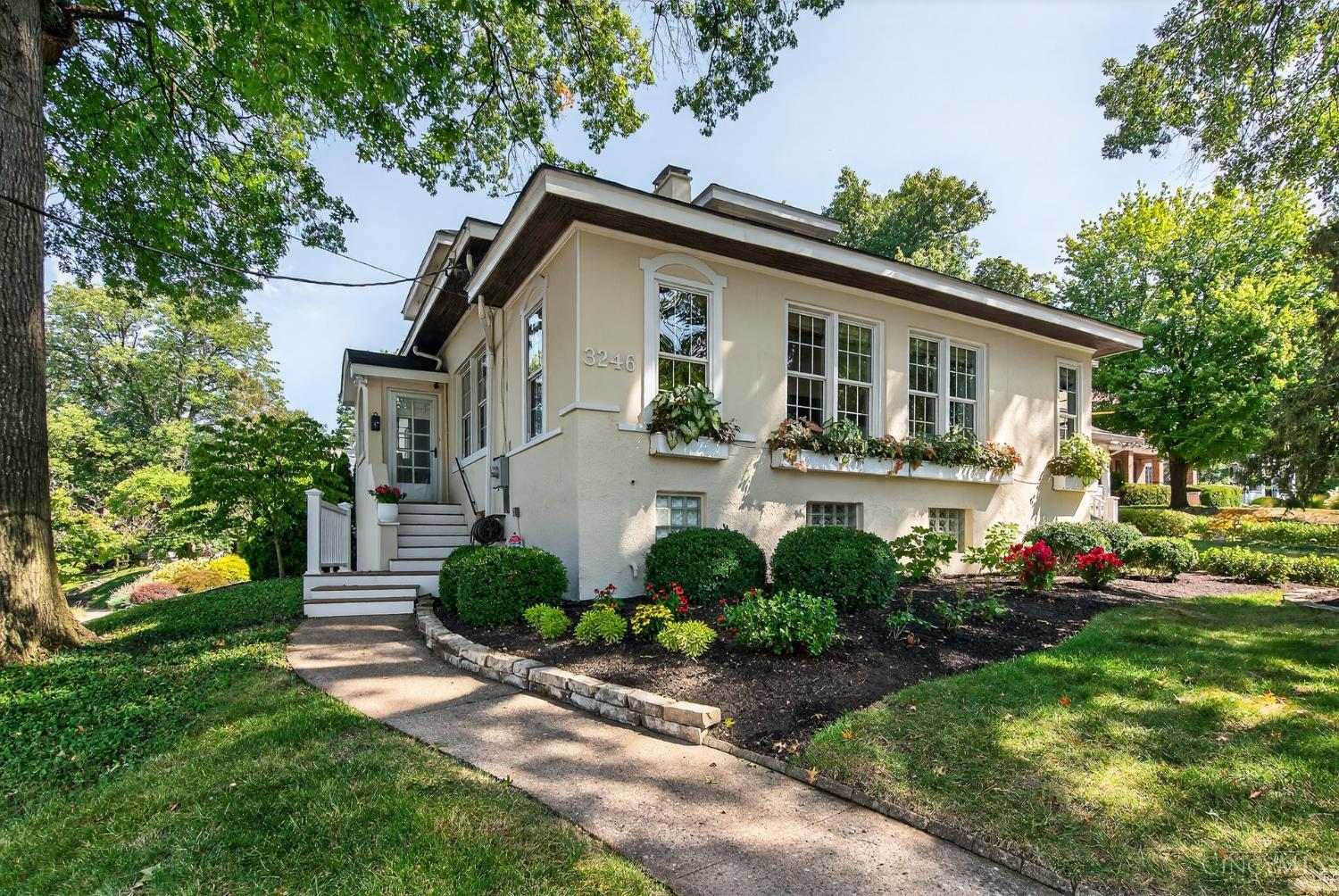 Experience quality craftsmanship & unparalleled features in this pristine home, perfectly positioned in a quiet, walkable neighborhood near Ault Park, Hyde Park Square, & Mt. Lookout Square, just minutes from Downtown Cincinnati. Inside you'll find an open floor plan with new hardwood floors, a Rockwood gas fireplace, & custom finishes throughout. The renovated kitchen impresses with Bosch appliances, a stylish tile backsplash, & a spacious pantry. A convenient first-floor bedroom & full bath add flexibility, while the finished, waterproofed basement with a full bath & abundant storage expands your living space. Step outside to your private outdoor oasis, complete with Pella patio doors, a TimberTech composite deck, & a motorized louvered pergola designed for shade or rain. The yard is enhanced with a sprinkler system, & the stucco exterior was freshly painted in 2025. With updated plumbing & electric, this home blends modern updates with timeless character--a true gem ready to enjoy!