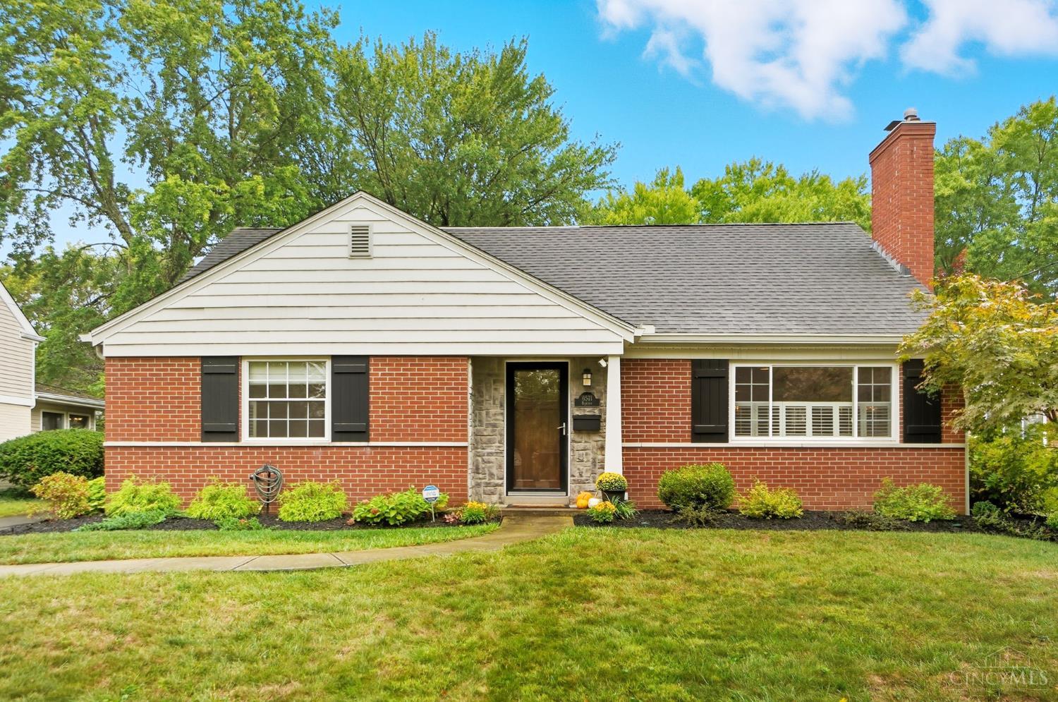 Tucked away on a quiet cul-de-sac, this 4-bedroom, 2.5-bath brick Cape Cod is filled with charm and space for everyday living. The large yard, surrounded by mature trees, offers plenty of room to play, garden, or simply enjoy the outdoors. Inside, the updated kitchen opens directly to the dining room and family room, creating a warm and inviting heart of the home where everyone can gather. A screened porch connects to the attached 2-car garageperfect for unloading groceries or relaxing on pretty evenings. The partially finished lower level adds extra space for a playroom, movie nights, or hobbies, while still leaving a large unfinished area for storage or future possibilities. Minutes from Kenwood and downtown Madeira, this home with its quiet setting, flexible living spaces, and thoughtful updates, is ready for its next owner to move right in!