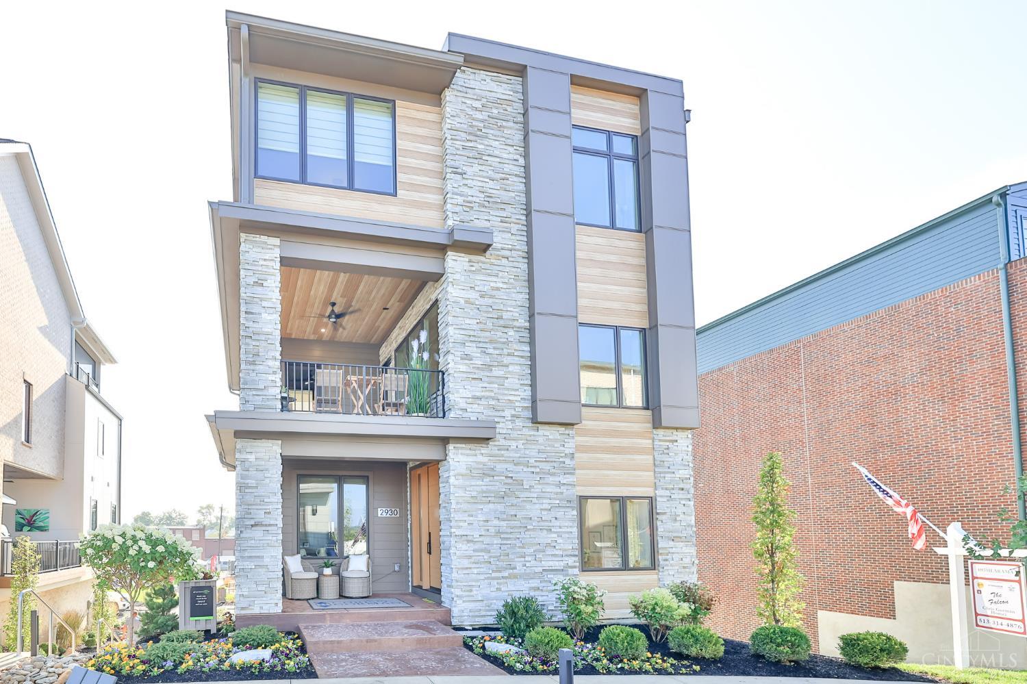 Experience Unmatched Luxury Living in Oakley. Step into a world of elegance with this stunning four-story Chris Gorman 2025 HOMEARAMA home, where every detail is thoughtfully crafted. Boasting state-of-the-art features & custom designs throughout, this home elevates your lifestyle. The main level welcomes you with a spacious two-car garage, offering direct access to both an open staircase and a private elevator that connects all four floors.The first and second floors, you'll discover three generously sized bedrooms along with a one-of-a-kind living space that redefines modern comfort.The gourmet kitchen and expansive great room effortlessly flow into an outdoor living area, creating the perfect setting for entertaining! At the top, the primary suite offers breathtaking views of the surrounding area. On clear nights, step out onto the attached balcony. Located in Oakley's newest Community of Foundry Park.Carefree Living & minutes from shopping and restaurants!Tax Abatement thru 2039.