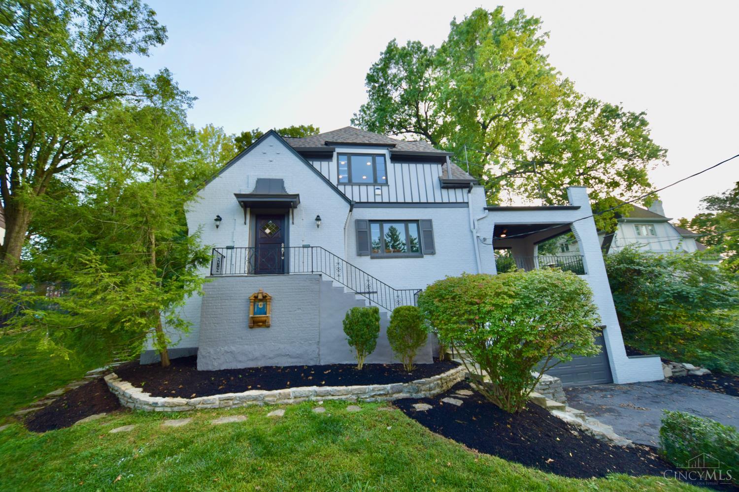 This beautiful home is situated a short walk to all the amazing options in Mount Lookout Square, like Delwood and VV Italian. The new exterior paint, roof, gutters, and various interior updates make this a space you will love to call home! The abundant outdoor and interior living spaces make it great for entertaining. Hardwood floors, coved ceilings, arched doorways, vintage tile, and beamed ceilings are just some of the elements that give this home so much character and charm. The basement features a cool space to relax and even has a built in bar. It is also plumbed for an additional bathroom. There is plenty of storage space including two cedar closets! Bonus room on second floor would make a great arts/crafts space or could be a second/kosher kitchen. Please leave offers open for 24 hrs.
