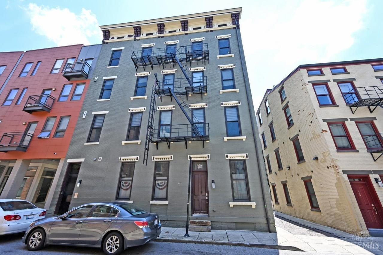 Stunning 3-Bedroom Condo in the Heart of OTR. Now Available! Don't miss this rare opportunity to own a beautifully designed, multi-level condo in Cincinnati's vibrant Over-the-Rhine neighborhood. This spacious residence offers over 1,800 square feet of modern living, featuring 3 bedrooms and 3 full bathrooms.     The expansive master suite spans the entire second floor and includes a versatile workout or rec room area, a luxurious en-suite bath, and a generous walk-in closet. Enjoy high ceilings, exposed brick walls, and an open-concept layout that seamlessly connects the gourmet kitchen to the sunlit living area.     Additional highlights include an in-unit laundry, private balcony, pet-friendly building, Mercer Garage within short walking distance, 1st floor bedroom with en-suite, ample storage, thoughtful interior design, and located on the top floor for exceptional light and privacy. Experience the perfect blend of luxury and city living.     Schedule your private tour today!