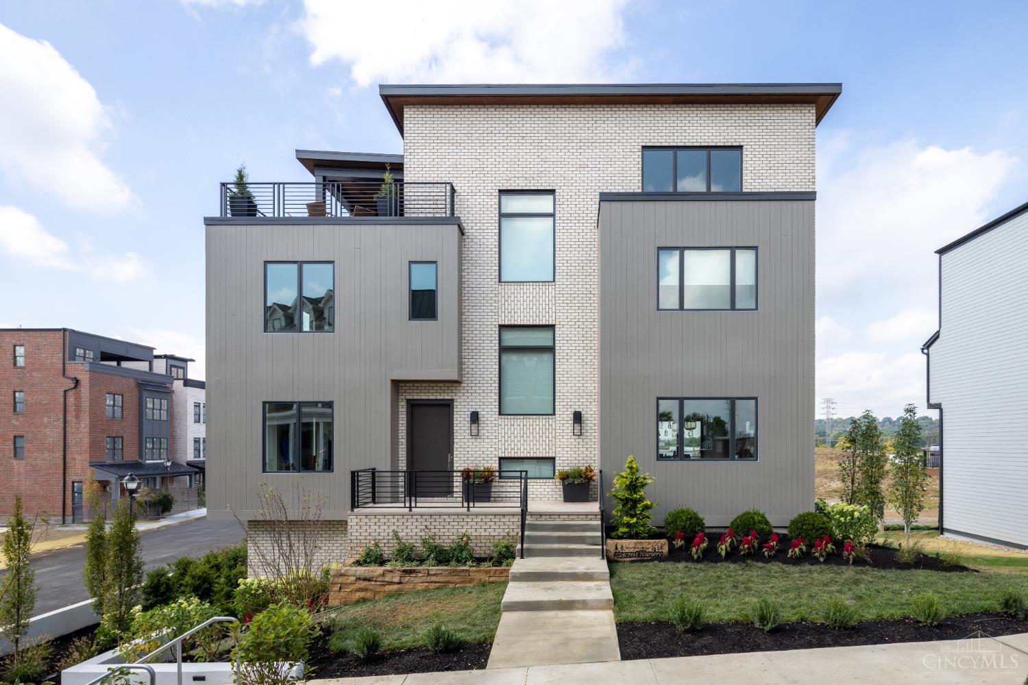 Classic Living is bringing their signature, luxury style to Foundry Park at Three Oaks: the exclusive community hosting Homearama 2025. Enjoy the ideal urban lifestyle in Oakley, just blocks from the popular restaurants, bars, and shops on Madison Road, and minutes from the dynamic offerings of Factory 52. This thoughtfully designed and fully furn. 4,000+ sqft, 3-bedroom, 4.5-bathroom home offers a modern open-concept layout perfect for entertaining. The main level boasts a spacious kitchen with a large island, a deck off the dining room, a walk-in pantry, and a welcoming great room with built-ins and a fireplace. On the second floor, you'll find two elegant bedroom suites, a convenient laundry room, and a versatile office/loft space. The rooftop level features a media room, a full bath and access to a luxurious outdoor living space. 10ft ceilings in LL, 1st and 2nd floors plus two HVAC systems for maximum comfort. Move in Oct 2025.