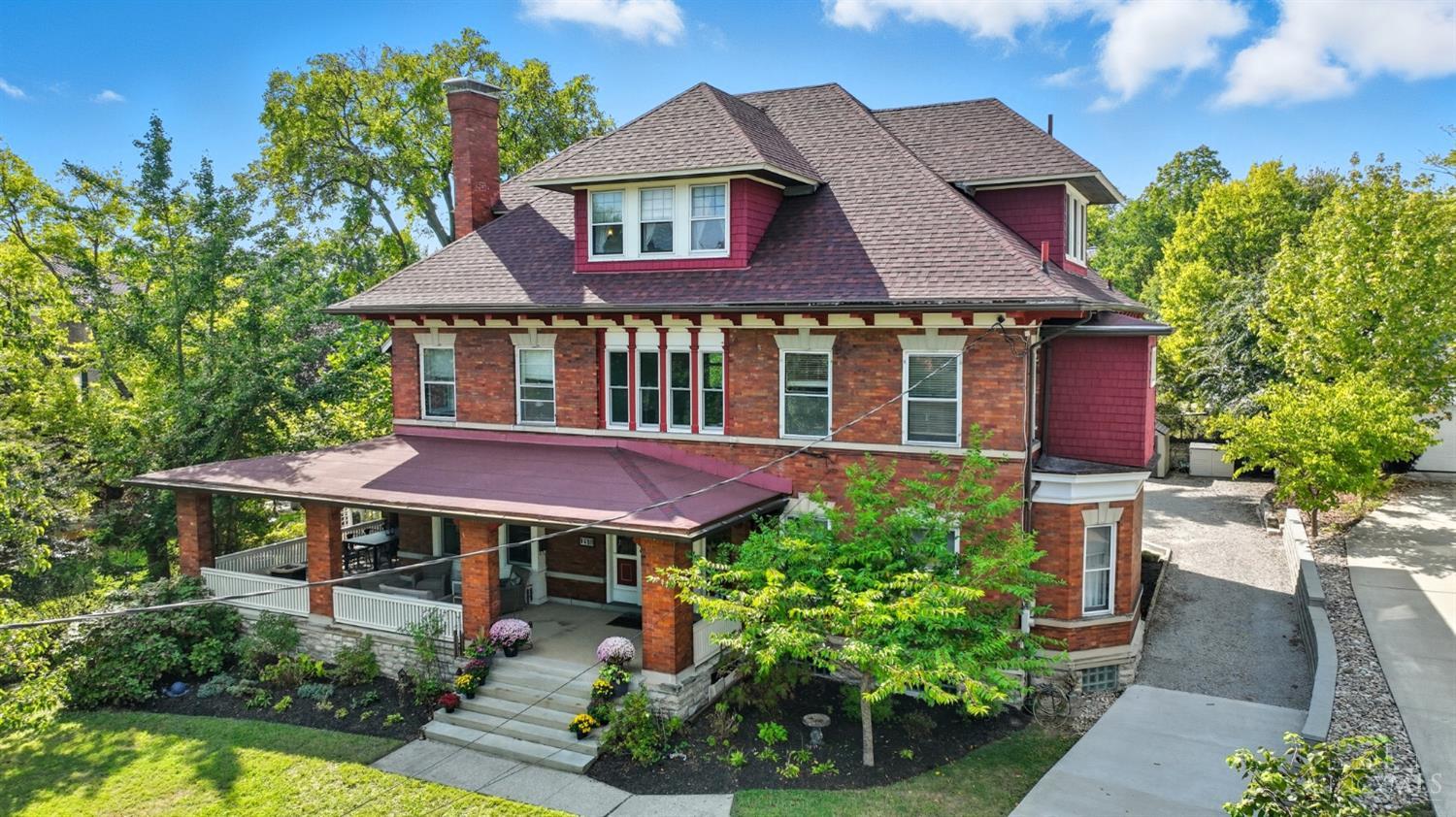 Stately and spacious, this nearly 5,000 sq ft North Avondale gem blends classic charm with modern amenities. Boasting 7 bedrooms, 3 full and 2 half baths, this home offers space to grow into and entertain with ease. Host in style with an expansive dining room, functional gas fireplace, and a light-filled sunroom that flows seamlessly into a private, fenced backyard oasis complete with a fully equipped outdoor kitchen and oversized hot tub. Thoughtful updates throughout meet timeless architectural details in one of Cincinnati's most desirable neighborhoods. A rare opportunity on beautiful Dakota Ave!