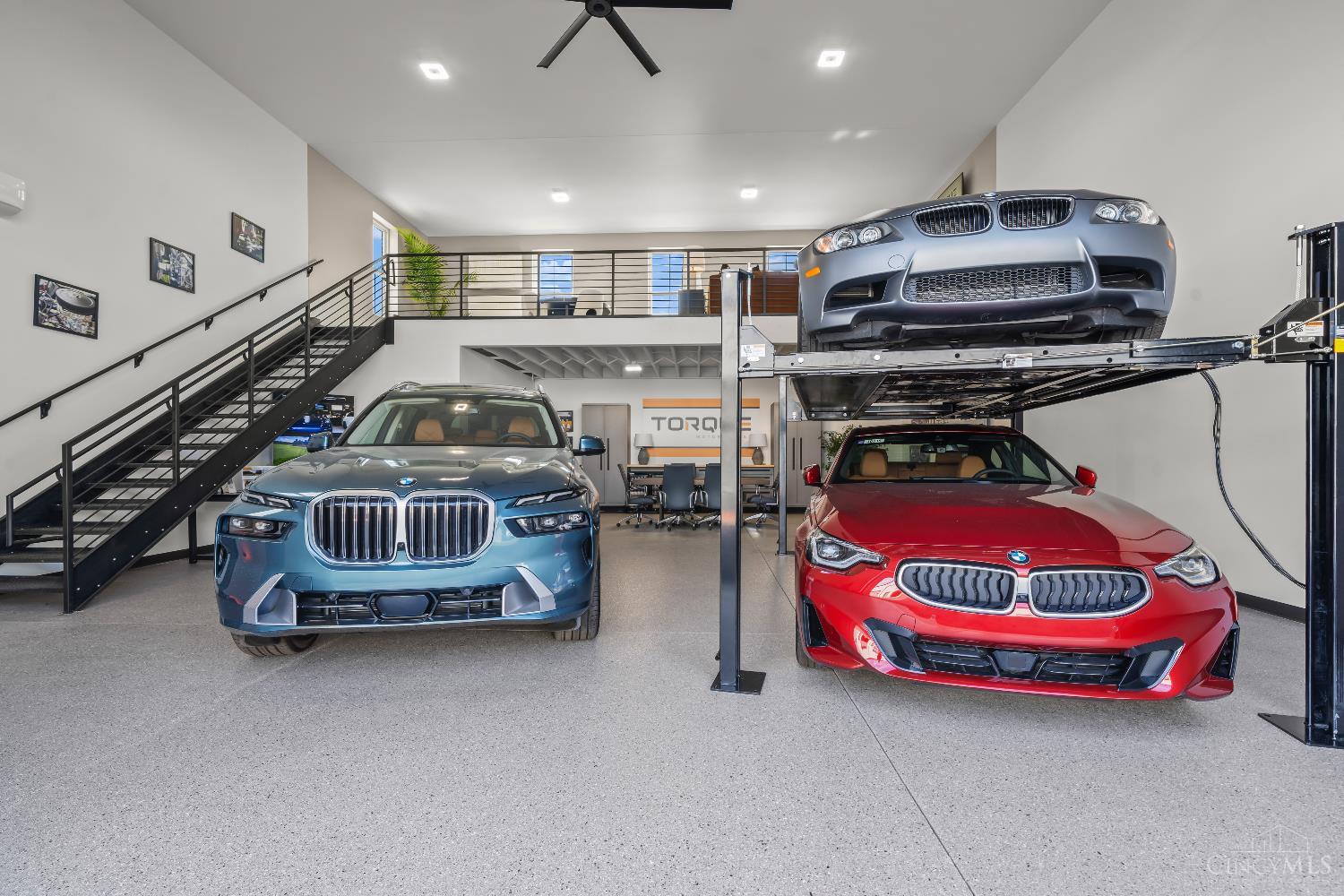 Open House Every Tuesday 4 - 6PM at our Oakley Torque Motor Suites Model!  (4477 34th Avenue, Cincinnati, OH Unit 3) Homearama's Model 2025! Ready Today! Torque Motor Suites - Oakley - Factory 52 - FALL 2025! This model unit is being sold fully furnished! Includes 2-100-inch TV's, 2 car lift, garage living and a fully furnished and painted lot.  Torque Motor Suites offers private, luxury units designed for individuals to store their prized possessions and unwind. The possibilities are endless - whether it's a sanctuary for a car collection, a home office, a post-retirement HQ,'' or an entertainment space,  you can make it your own. Model Unit!