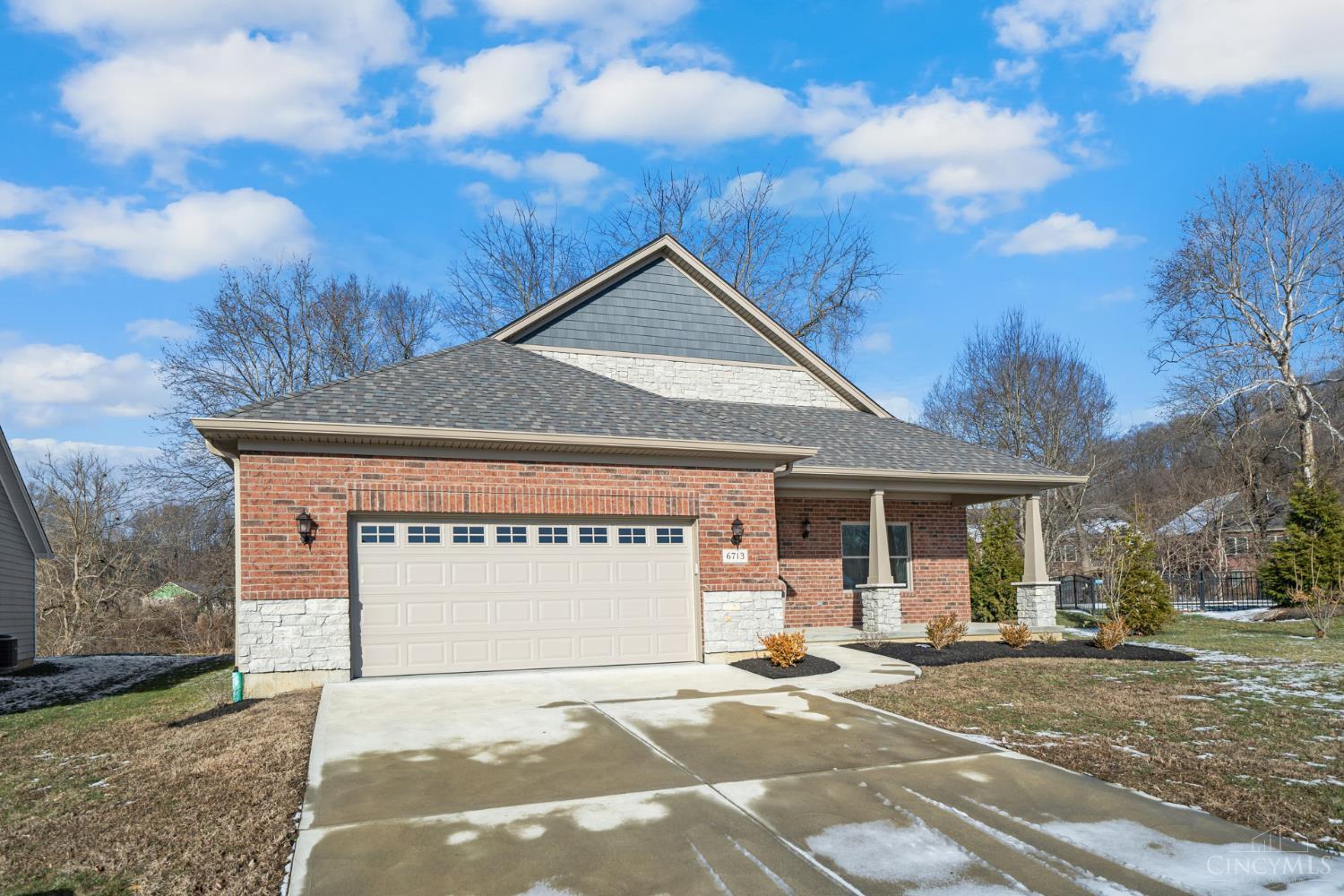 This impressive new construction in the Winding Walks Community offers high-quality finishes and quiet cul-de-sac living. The 4-bedroom, 3.5-bath ranch features a step-free layout with a full finished basement. Enjoy an open floor plan with a gourmet kitchen granite countertops, stainless steel appliances, wood cabinetry, and hardwood floors plus a dining area that opens to a covered deck and private yard. Highlights include a gas fireplace, recessed lighting, and a main-level primary suite with granite-adorned bath. The spacious lower level includes a large family room, two bedrooms, a full bath, and ample storage. LEED Gold certified and tax-abated through 2036, this home is available for traditional sale, owner financing, or a flexible 3-year lease-to-own option. To secure the lease-to-own, a nonrefundable down payment and first month's rent of $3,200 are required, with the full down payment credited toward the purchase price if bought within the lease term.