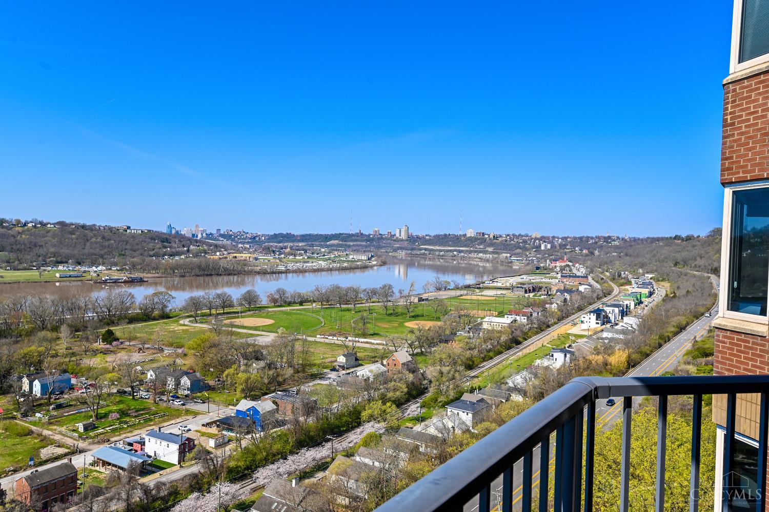 Panoramic river, downtown & Kentucky views from every window of this 2400 square foot Meridian condo! Spacious primary bedroom suite, living & family room, all walkout to private terrace/ granite stainless fully equipt eat-in kitchen, in unit laundry, marble floors, crown moldings, 2 car garage - doorman, fitness room, pool - 1 of only 3 units on this floor! Immediate occupancy - neutral decor - great additional storage space - 2 prime garage spaces #62 & 63 and storage locker #62.