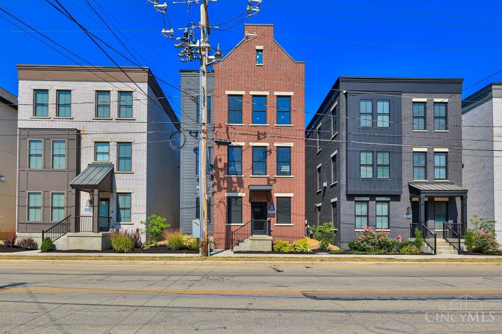 Move in TODAY and experience Foundry Park at Three Oaks! This stunning home offers a first-floor bedroom with full bath, dramatic two-story breakfast area, optional elevator, and a dedicated study or office. Enjoy high-end finishes including Thermador appliances, quartz countertops, site-finished hardwood floors, 9-foot ceilings throughout, and an ELAN smart home system. Benefit from a 15-year LEED Silver tax abatement. Ideally located just blocks from Oakley Station, Rookwood, and Downtown Oakley. Foundry Park features pocket parks, lush landscaping, and amazing community gathering spaces. Lot 3.