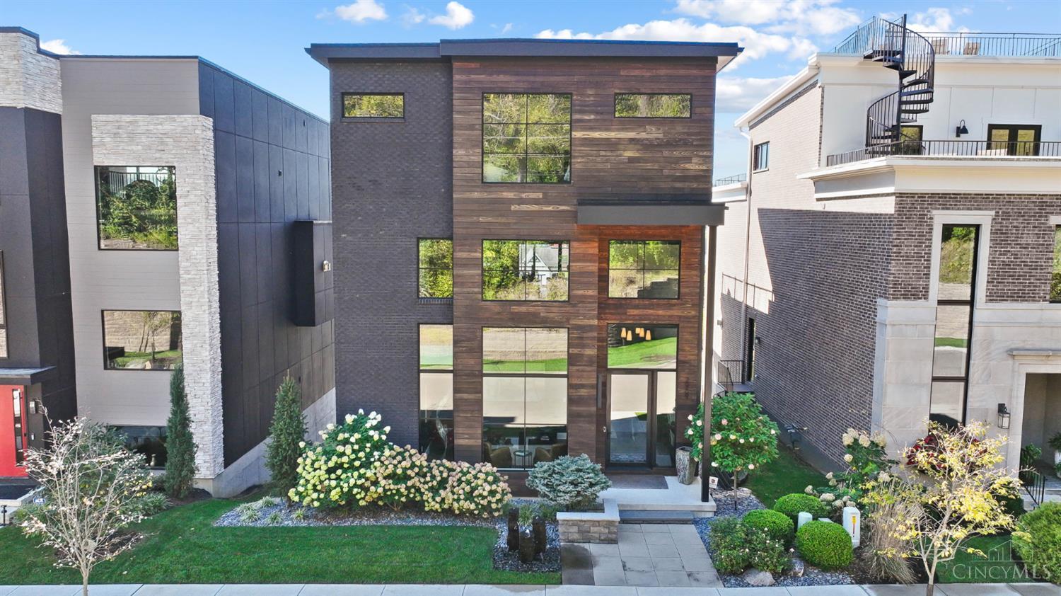 Enjoy luxury city living w/spectacular river + city views from this stunning 5-year young home in Walworth Junction*LEED Gold tax abated through 2035*TIF assessment fee of $150K paid in full by Seller*Over 5,200 SF of living space w/many upgrades + custom finishes throughout*Rich in amenities including elevator access to all floors, 1st floor primary suite, chef's kitchen, exercise room, riverfront terraces, BBQ grill, 2-car GAR*The ultimate urban estate in eclectic & walkable East End*Minutes to Downtown*An entertainer's dream.