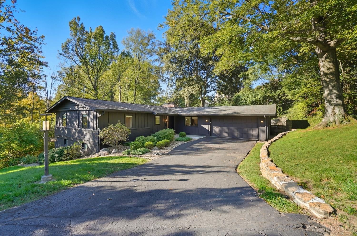 Stunning Renovated Ranch Backing to Ault Park    Beautifully renovated interior in 2019, this 4-bedroom, 3-bath ranch with a walk-out basement offers 3,066 sq. ft. of thoughtfully designed living space. Tucked at the end of a quiet Deepwoods Lane cul-de-sac, the home backs directly to Ault Park, providing rare privacy and tranquil views. Enjoy modern craftsmanship throughout, spacious living areas, and seamless indoor-outdoor flow. Walkable to Mount Lookout and Hyde Park Square, this home combines serenity, style, and an unbeatable location.    Seller is Agent