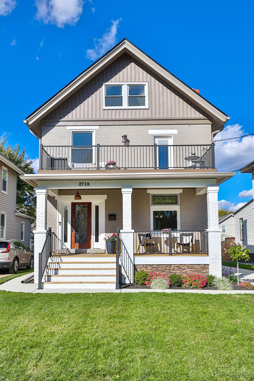 Welcome to the new Oakley-where timeless charm meets modern luxury! This beautifully reimagined home offers the character of an established residence paired with today's most sought-after amenities. Step inside to an open floor plan designed for both everyday living and elegant entertaining. The gourmet kitchen is a showpiece with premium finishes, while the spacious living areas flow seamlessly to a first-floor bedroom and full bath, offering exceptional flexibility.  The primary suite is a true retreat, featuring a cozy fireplace, spa-inspired ensuite with a large shower, double vanity, and walk-in closet, plus a private second-floor balcony-perfect for morning coffee or unwinding at day's end. Every detail has been meticulously updated, including new mechanicals, roof, interior and exterior paint, flooring, kitchen, and baths. A garage adds convenience, and the property is tax abatement eligible with all work fully permitted. This is Oakley living at its finest. Owner/Agent.