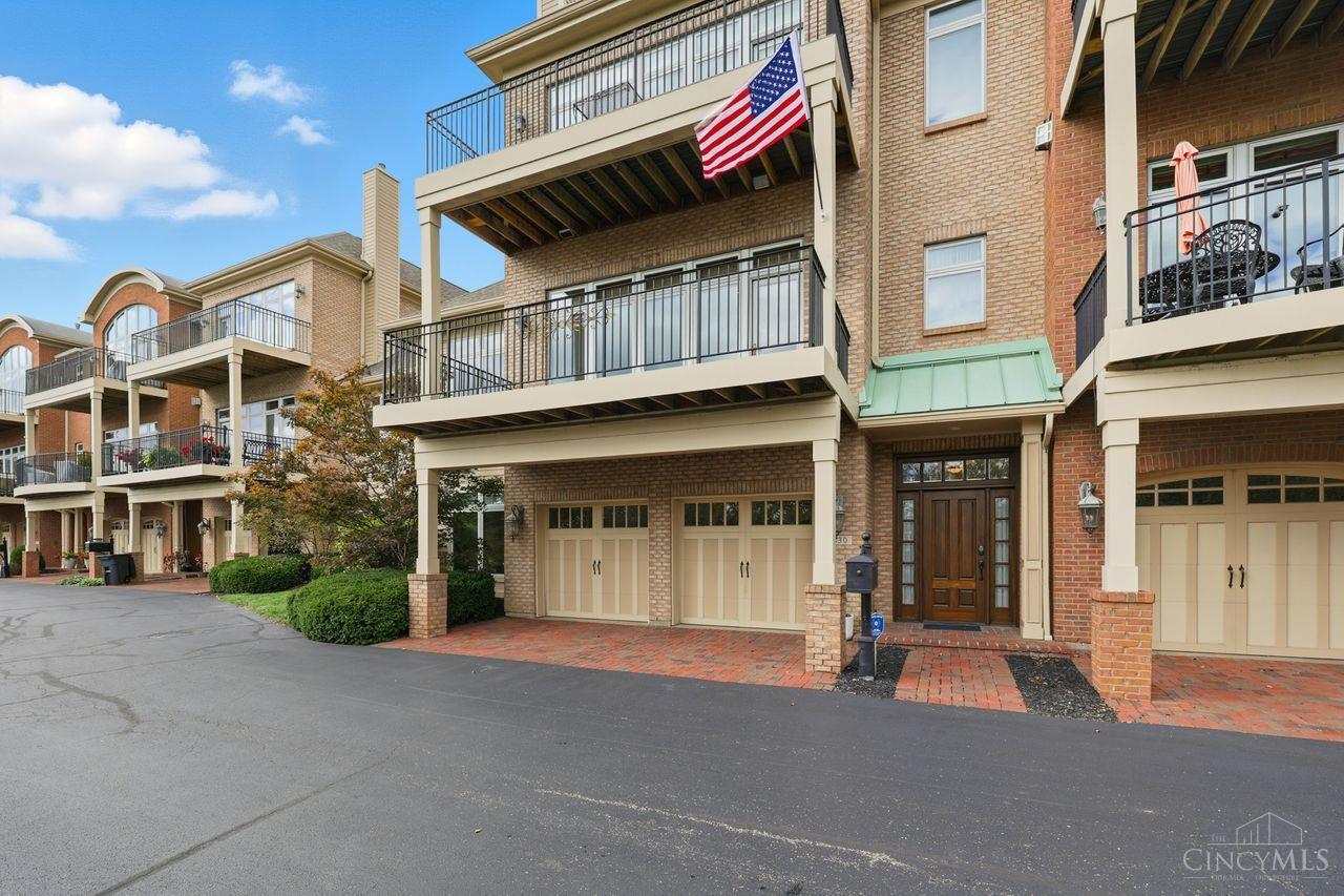 Welcome to your turn-key Riverside home in Twain's Point. End-unit, luxury upgrades thruout, lock & leave lifestyle. Riverfront park system at your doorstep: walking paths, pickle ball, bike lanes. Moments to dwntwn dining, shopping, events, employers.  Fabulous views of Ohio River, hills of KY, Cincy Skyline! Gourmet kit w/island, cntr bar, granite, new Sub-Zero refrig, gas cooktop, wine cooler. Entertaining is a breeze w/ open/bright liv/din space, 2 private balconies & patio. Hdwd flrs thruout main living & upstairs bdrm level. Stunningly upgraded primary bathroom w/ dble vanity, walk-in shower, soak tub, heated flrs. New custom blinds in primary ste w/ fireplace, built-ins. End-unit, bonus rooms include main floor office/study w/ built-in bookshelves & 15x12 1st flr exer/wrkshp/hobby/storage. 2 car+ gar w/ custom cabinet, refrig. 3,200+ SF w/3 ensuite bdrms/full ba, 1/2 ba main liv level, crown molding, builtin, 2FP Great value considering Lux options on river in EE!