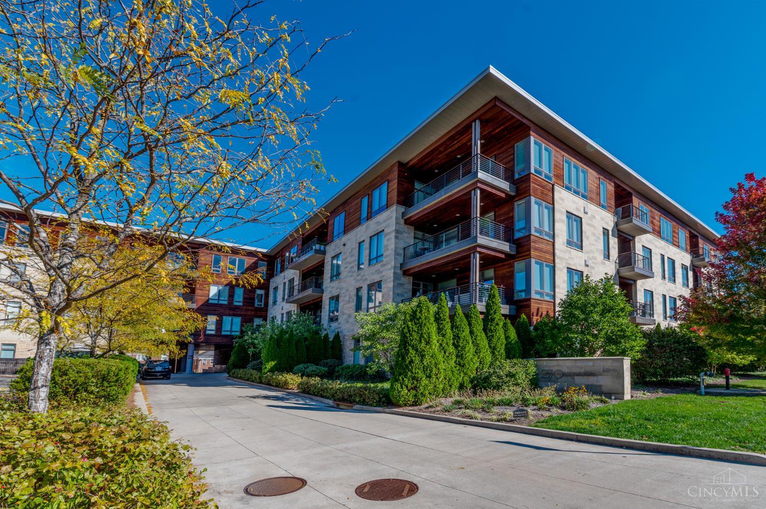 Sun-filled luxury one floor condominium just 1 block from Hyde Park Square! Over 2867 square feet w/ 3BR/2.5 BA (one configured as home office/study and its own private balcony) open great room/kitchen with gas fireplace and walkout to oversized covered patio - beautiful hardwood floors - high ceilings - beautiful views - 3 designated garage spaces - tax abated LEED Gold through 2033 - in unit laundry room - large designated storage unit on same floor as unit - great living!! Leave offers open for 48 hours, seller reserves the right to accept an offer prior.