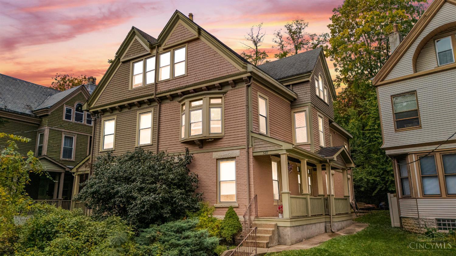 Impeccably designed and full of character, this 4-bed, 3.5-bath Clifton home offers over 3,000 sq ft of thoughtfully updated living space. A seamless blend of timeless architecture and modern finishes welcomes you from the covered front porch into an open-concept layout that flows effortlessly between the living, dining, and kitchen areas. The kitchen features granite countertops, stainless appliances, and opens to a private patio ideal for indoor/outdoor living and entertaining. Upstairs, a spacious top-floor bonus room with wet bar offers flexibility for a guest suite, office, or media lounge. Hardwood floors, crown molding, and abundant natural light accentuate three levels of living.     Conveniently located minutes from the Cincinnati Zoo, University of Cincinnati, hospitals, and downtown - this move-in-ready home combines accessibility, space, and Clifton charm. Schedule your tour now. Video Tour attached!