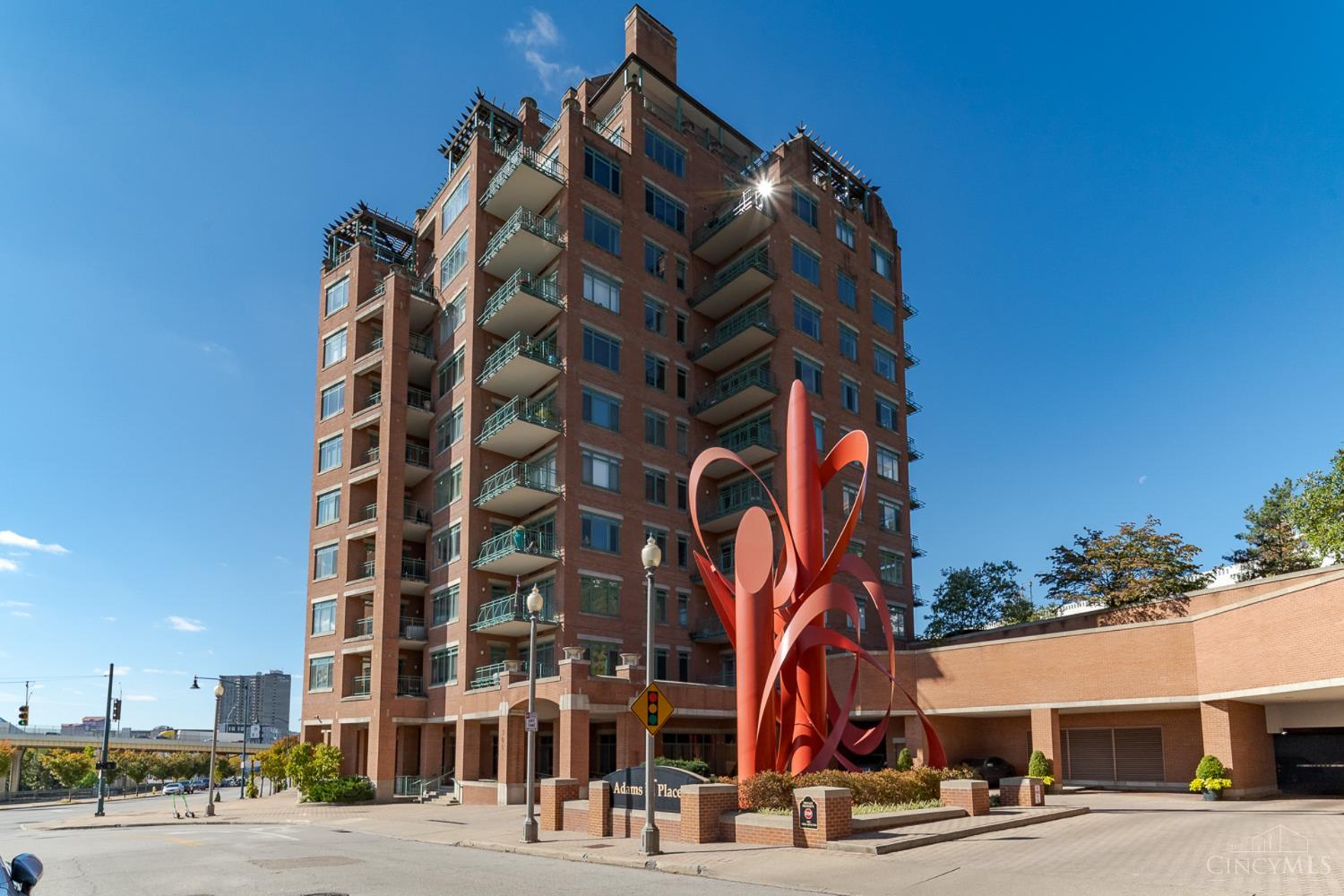 Stunning! Adams Crossing's Finest !From the moment you enter this home, you will be captivated by the effortless views! The Sunsets over the city skyline, reflecting on the river below are spectacular! Designer wall tones, carpeting,and custom window treatments throughout will marry w most discriminating tastes! The 24 hr. Concierge Service/Greeting Station is unparalleled ,offering a car and driver upon request! An  Absolutely Gorgeous Library/Social Gathering Rm is available for daily resident use and private resident parties! The Exercise Facility/RM and Heated Pool are enjoyed by many,along with the Community Fire Pit, Grille , Putting Green,Secure Fenced Dog Park, and Parking Garage. There is Ample Parking for Guests in the expansive lot adjacent to the building. 2 Guest En suites ( 1 shown in photos) can be reserved upon request for resident visitors. Scenic Walking Trails and Pickle Ball Courts are close at hand! This is an Amazing Lifestyle and an Absolutely Beautiful Home!