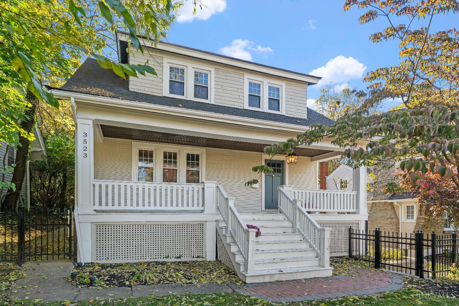 Come see this charming, fully updated bungalow in a prime location with all the space you could want in an 1920 home! Enjoy a beautifully renovated kitchen with quartz counters, farmhouse sink, pantry, and cozy breakfast banquette that opens to the living area  perfect for everyday living and entertaining. Refinished original hardwood floors, new carpet, and thoughtful updates throughout. The second floor features convenient laundry (laundry in basement too!!), 4 spacious bedrooms and 2 full baths. Primary bedroom includes giant walk in closet, extra office/study space & an en suite bath. Great location with an off-street trail to Ault Park, schools, restaurants, and shops all super close by. So much space, charm, and style all in one! Unpack & settle in before the holidays are here!